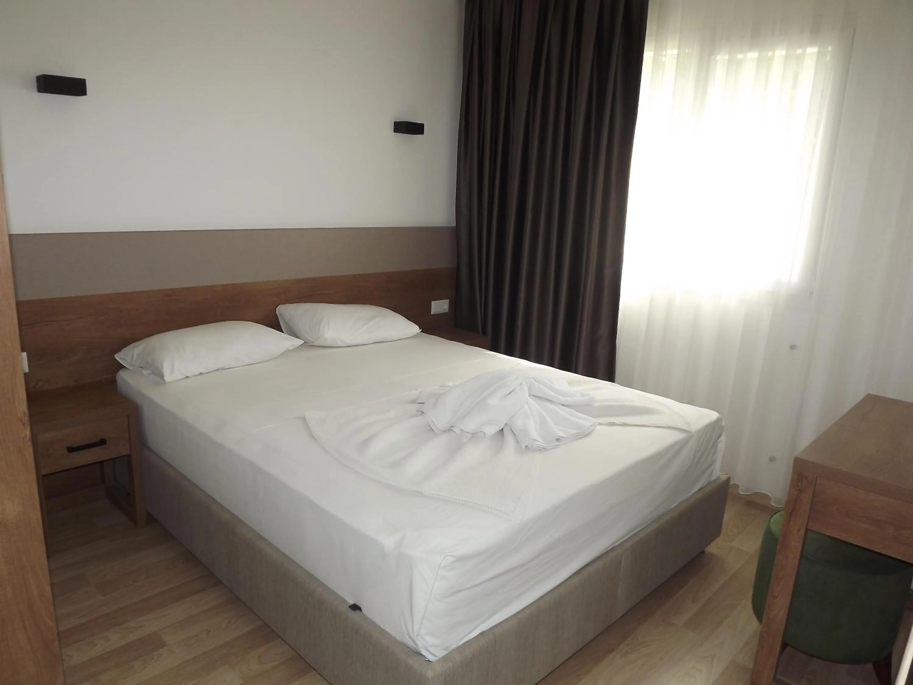 Bed in Opus Apart Hotel
