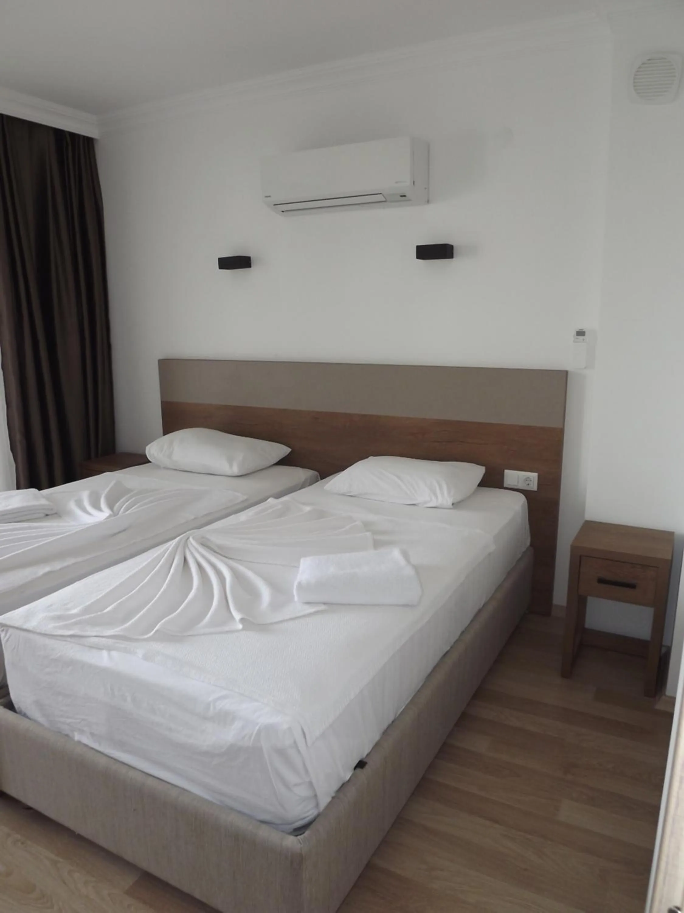 Bed in Opus Apart Hotel