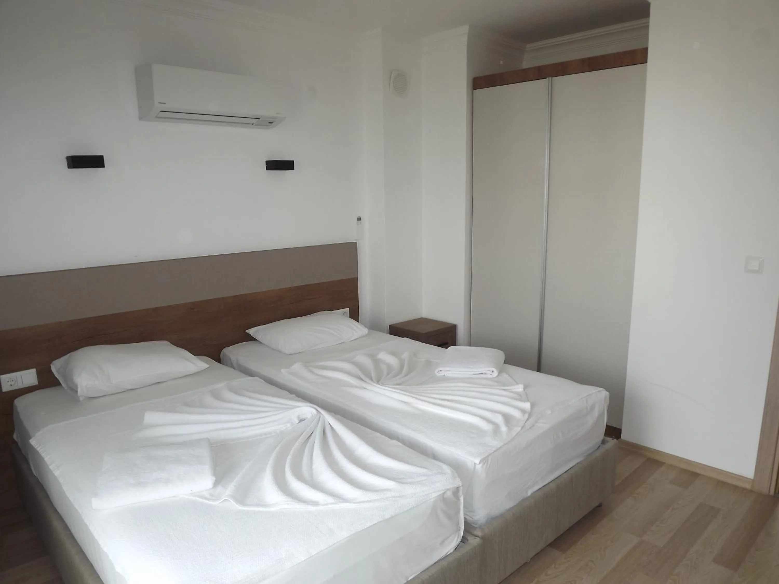 Bed in Opus Apart Hotel