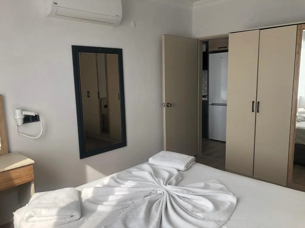 Bed in Opus Apart Hotel