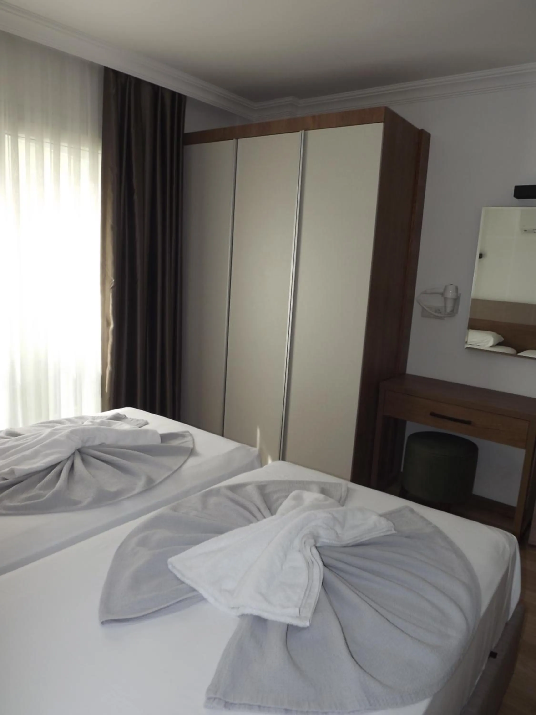 Bed in Opus Apart Hotel