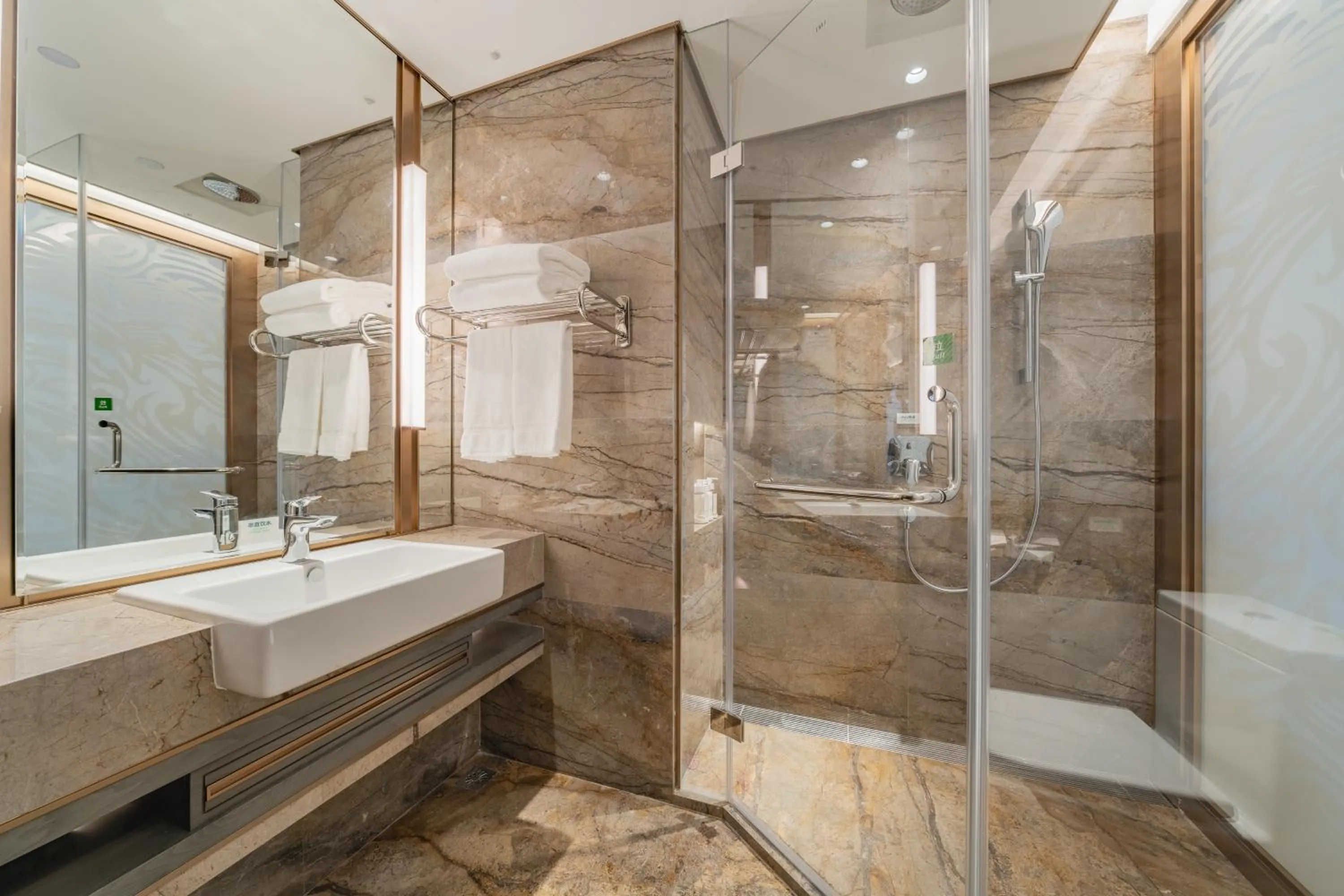 Bathroom in Holiday Inn Zhengzhou Zhongzhou by IHG