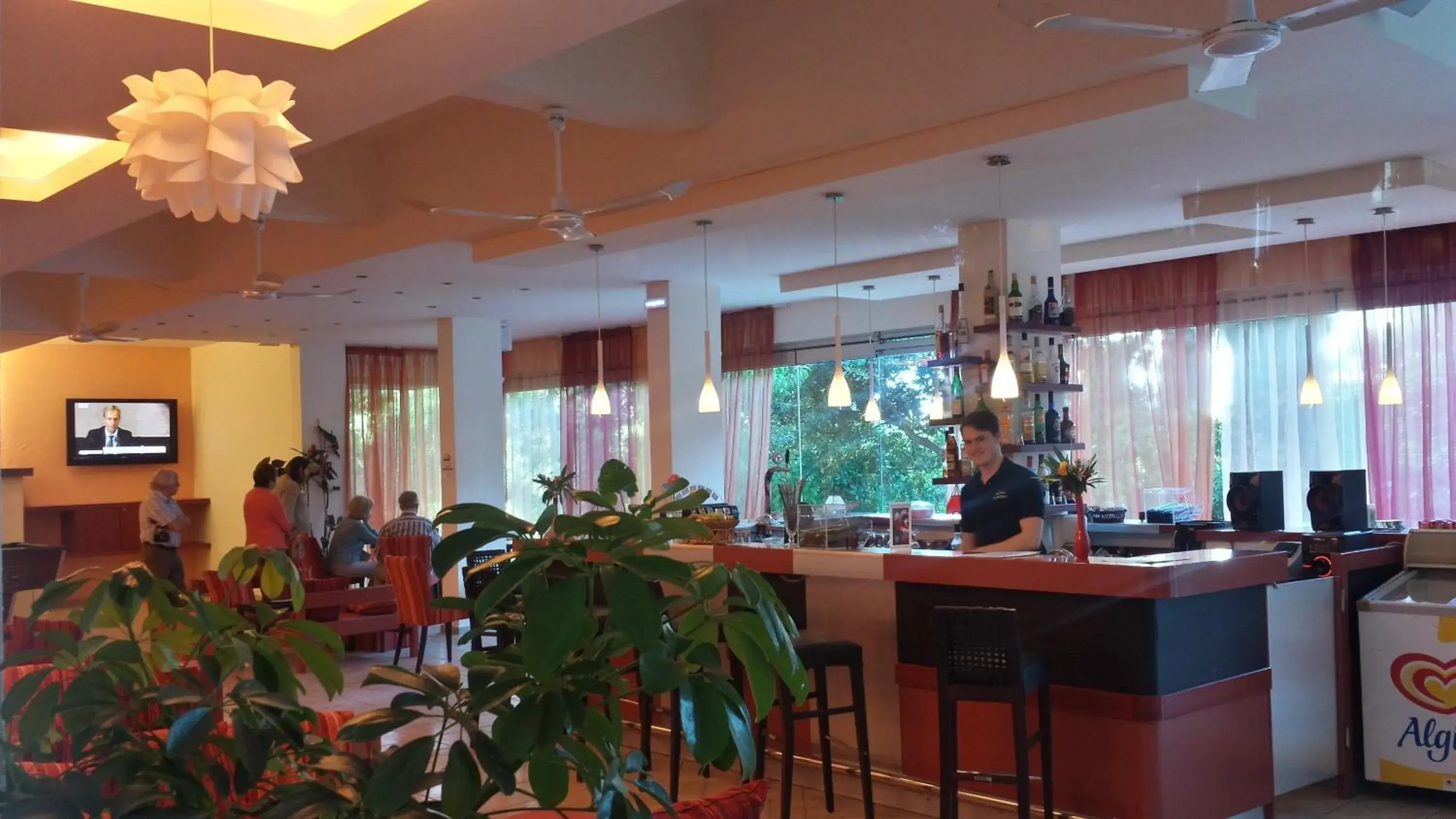 Lounge or bar in Ipsos Beach Hotel Lounge or bar in Ipsos Beach Hotel