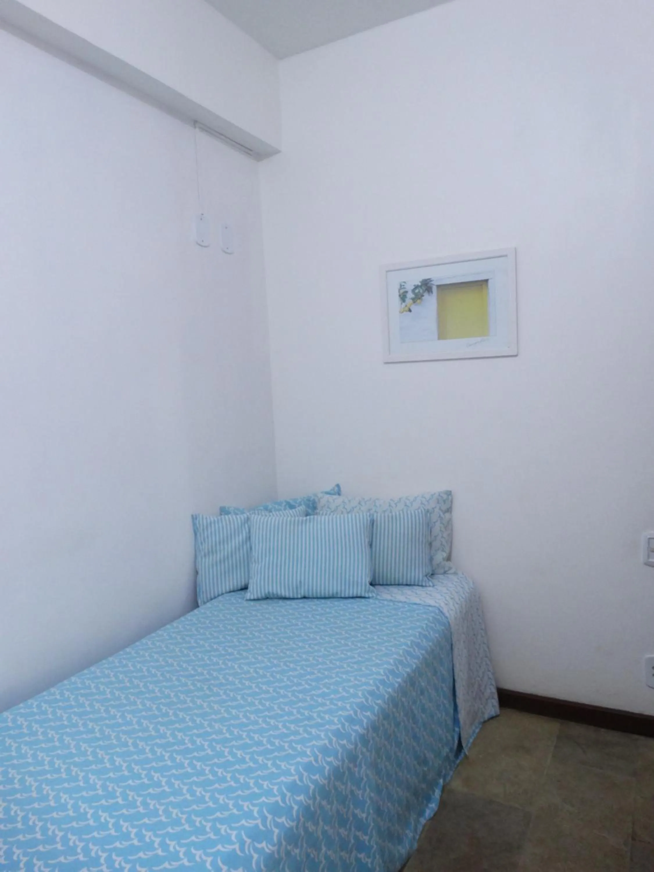 Bed in Viva Búzios Flats
