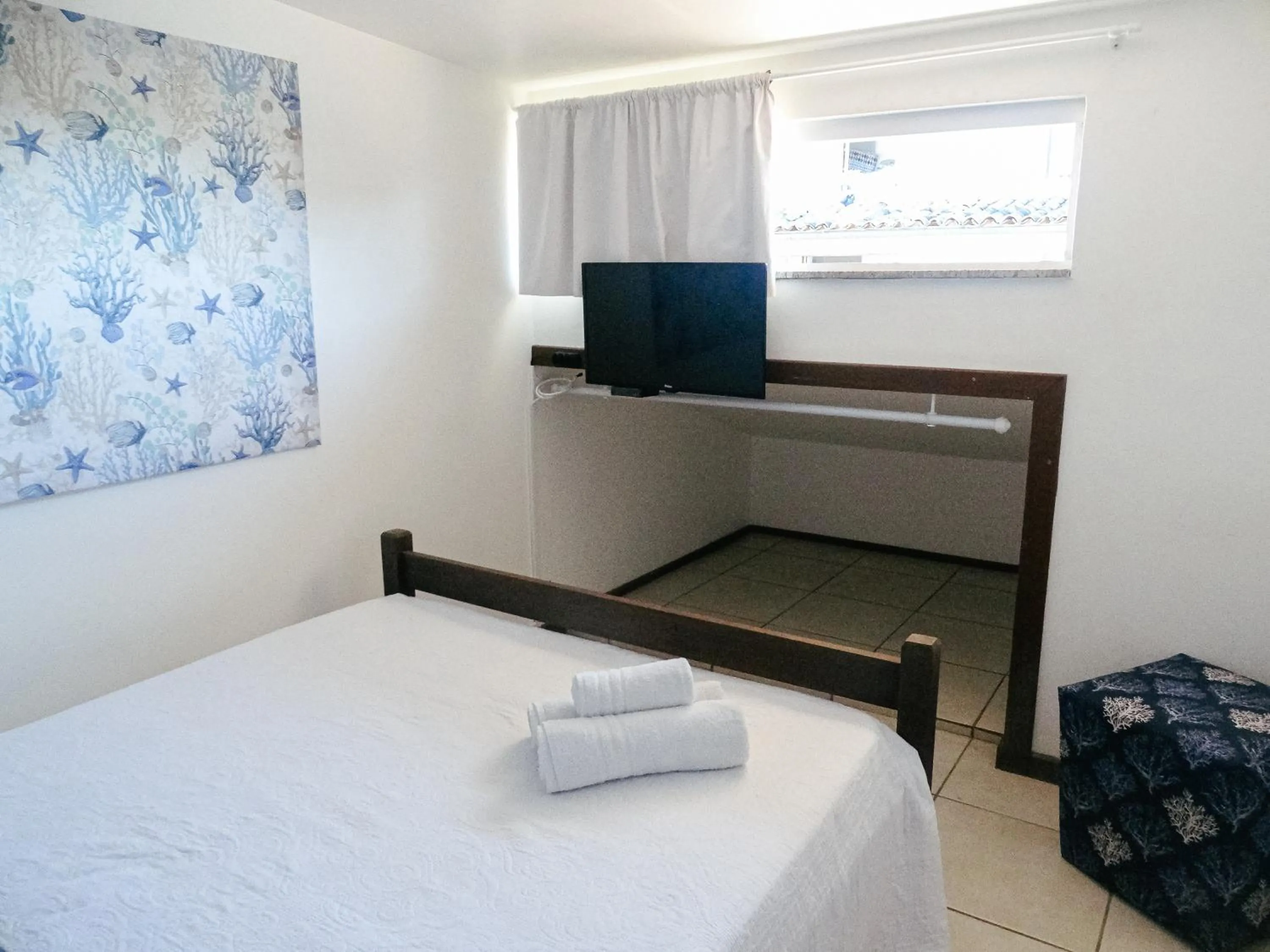 Bed in Viva Búzios Flats