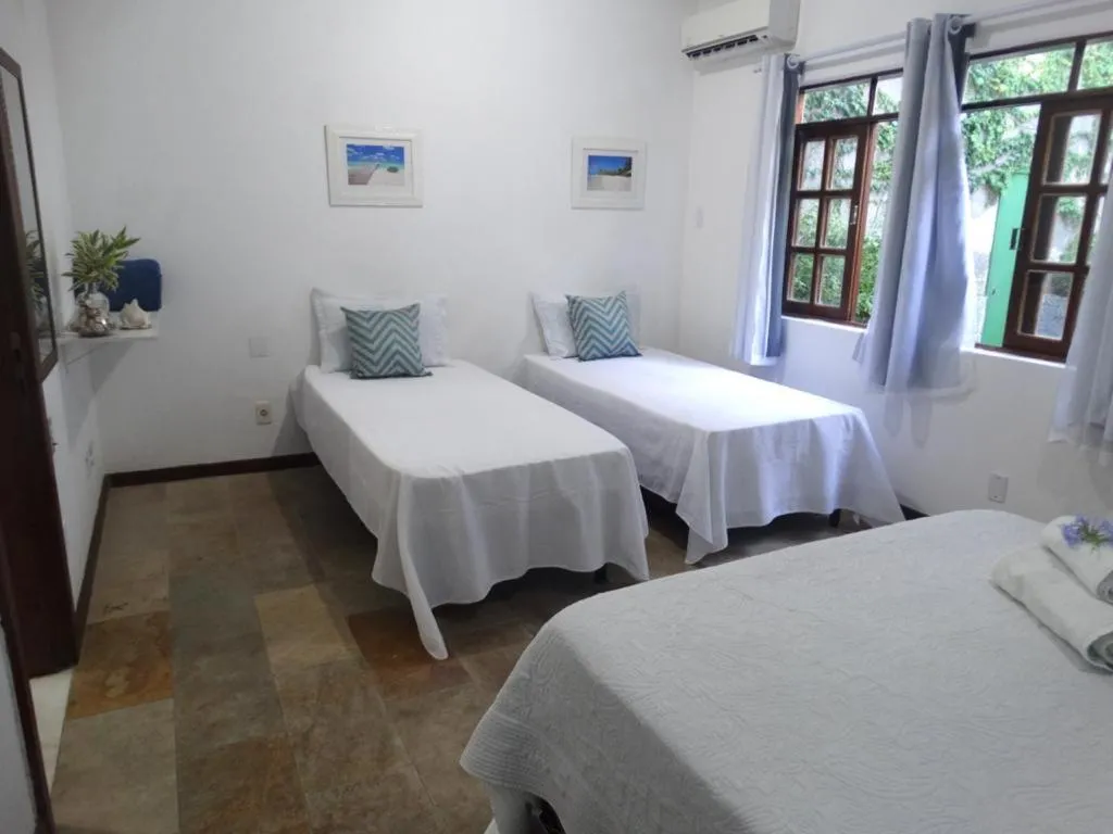 Bed in Viva Búzios Flats