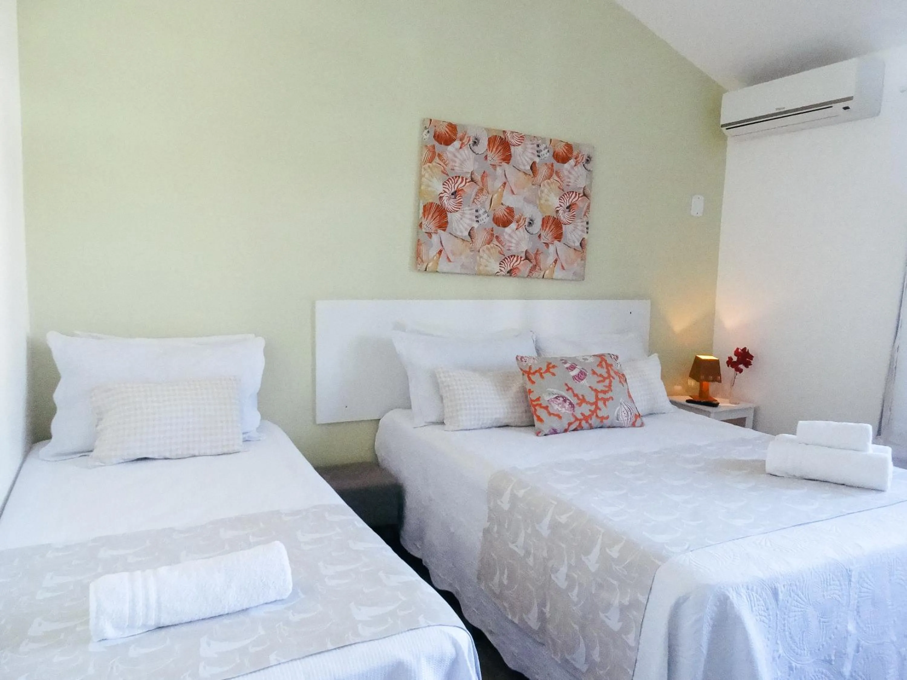 Bed in Viva Búzios Flats