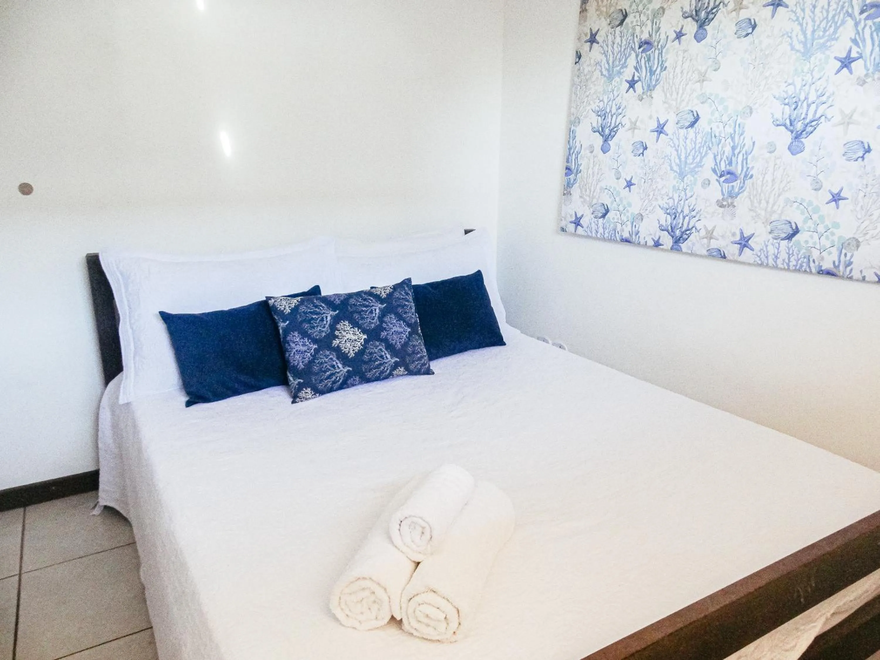 Bed in Viva Búzios Flats