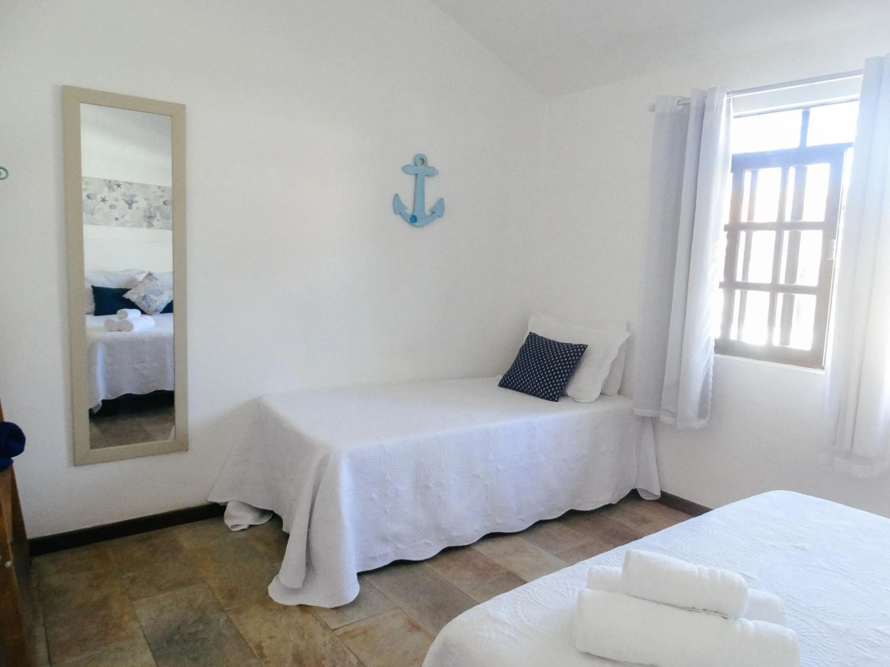 Bed in Viva Búzios Flats