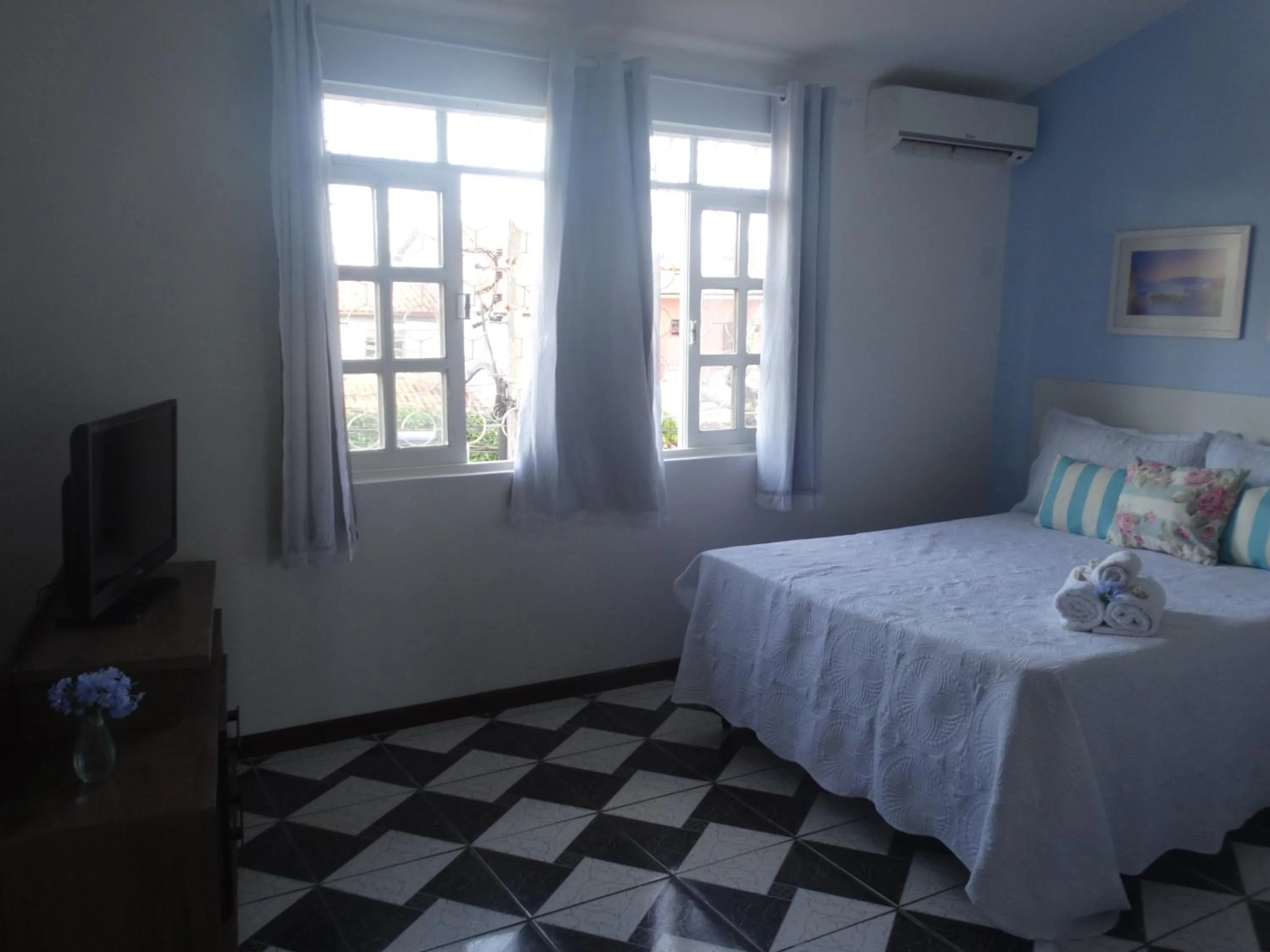 Bed in Viva Búzios Flats