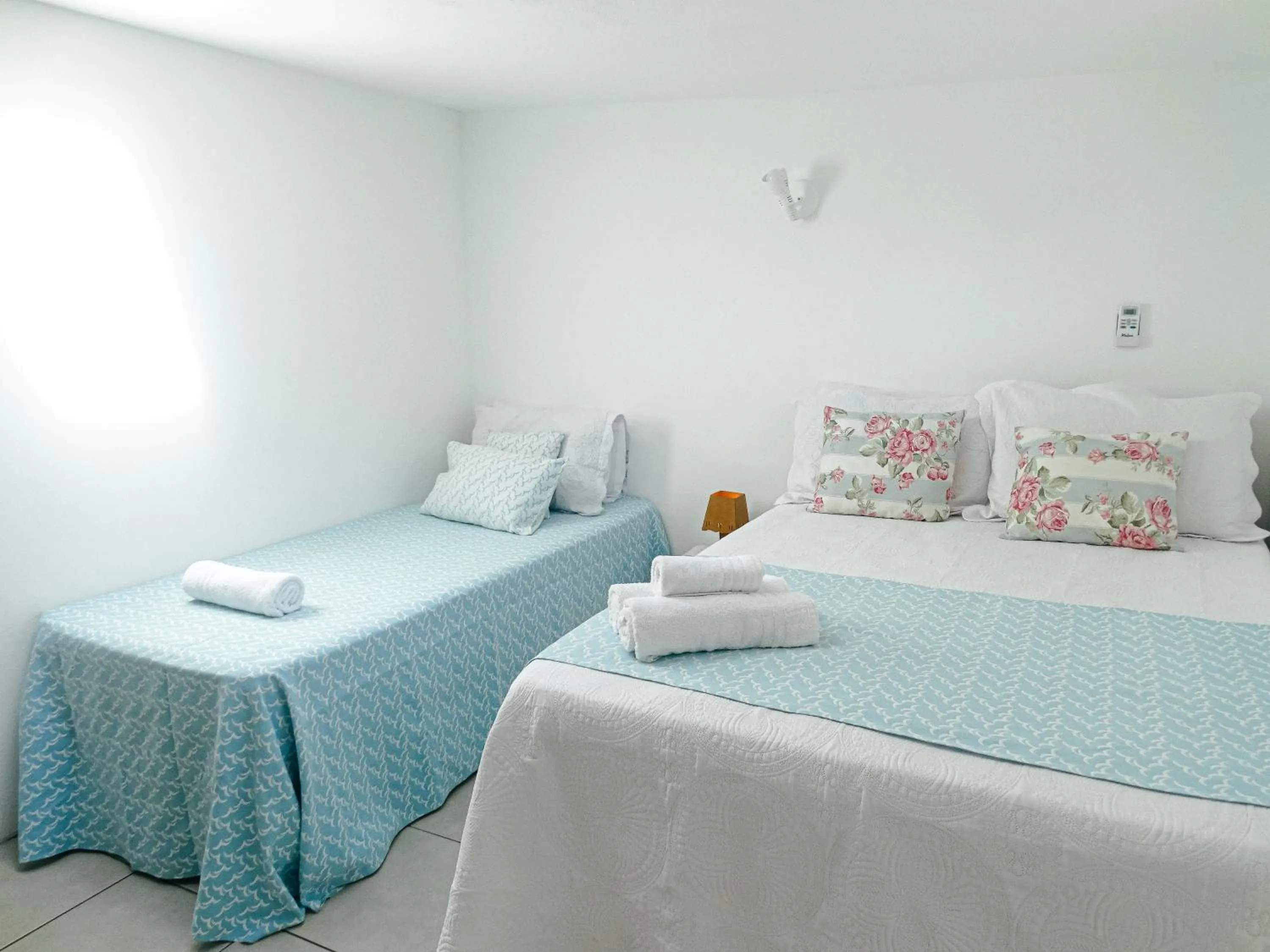 Bed in Viva Búzios Flats