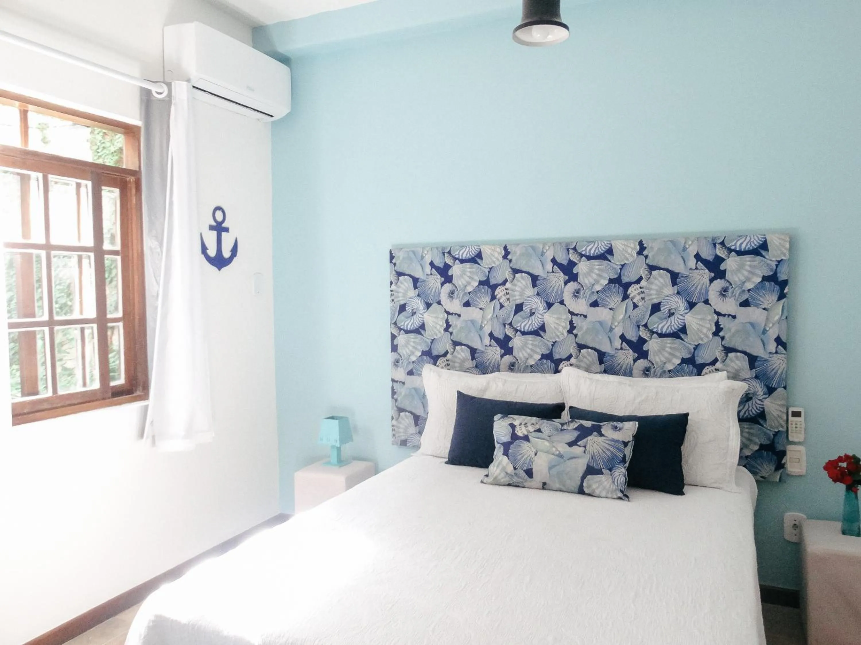 Bed in Viva Búzios Flats