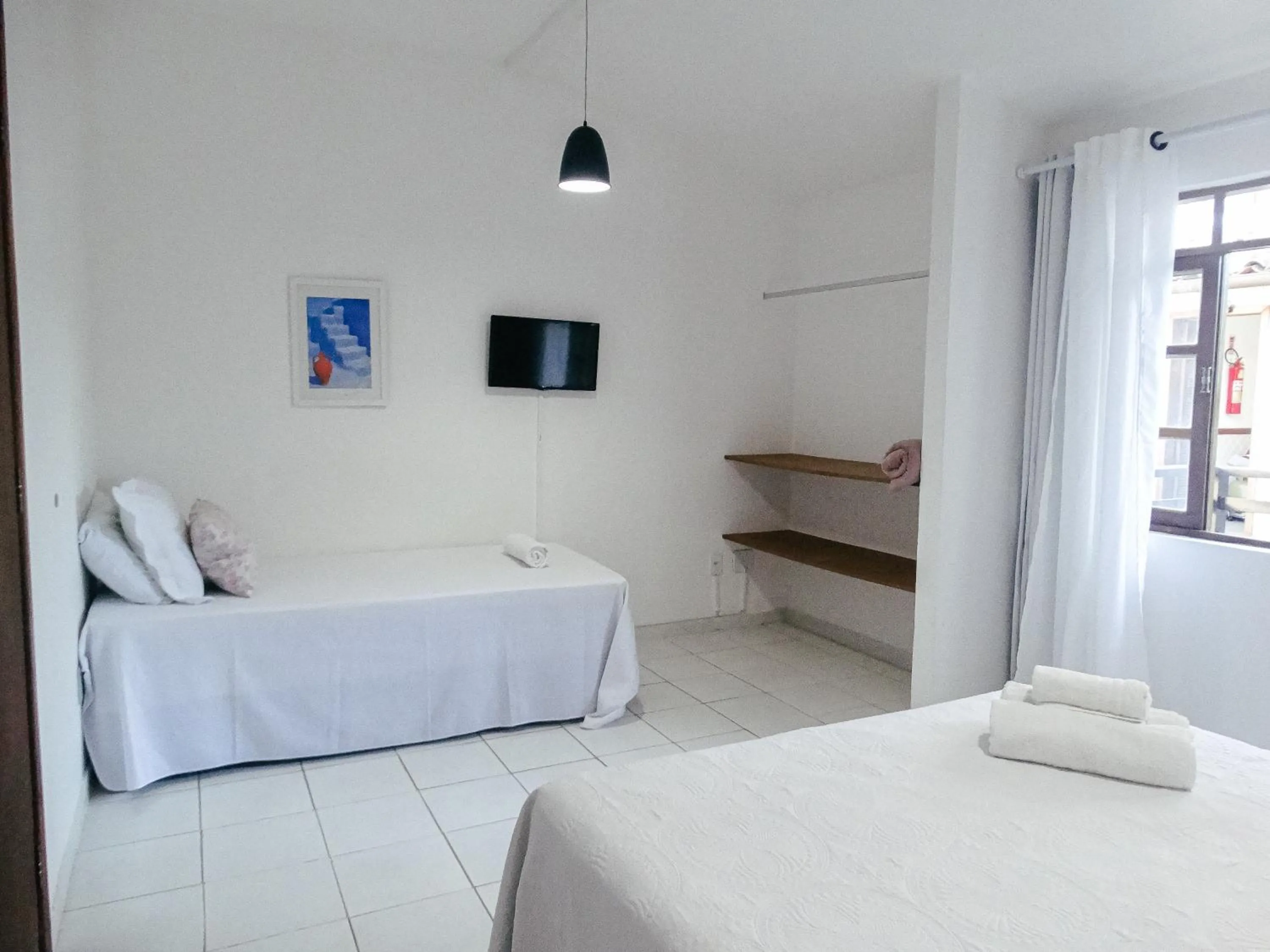 Bed in Viva Búzios Flats