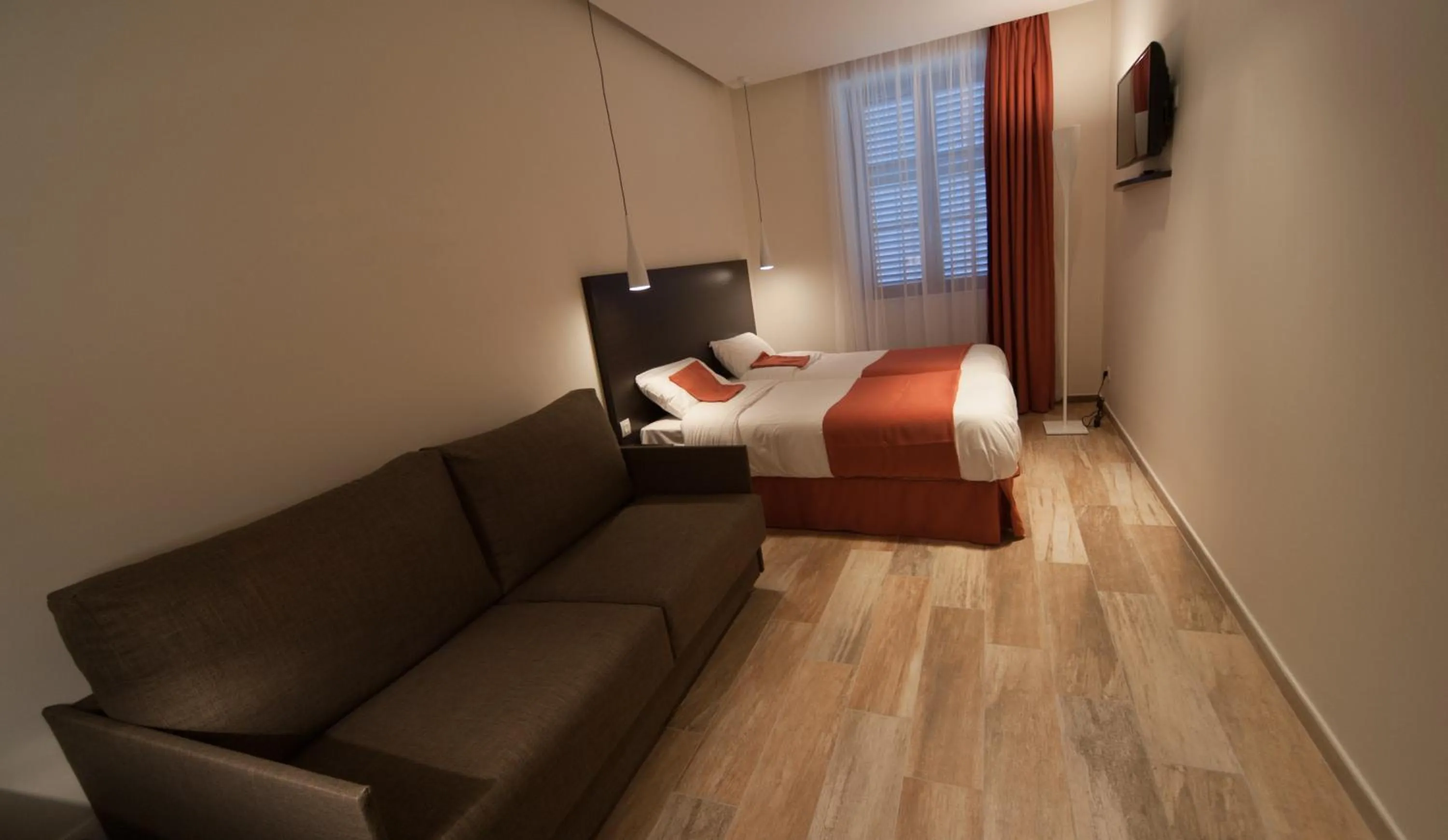 Photo of the whole room, Bed in Central Hotel