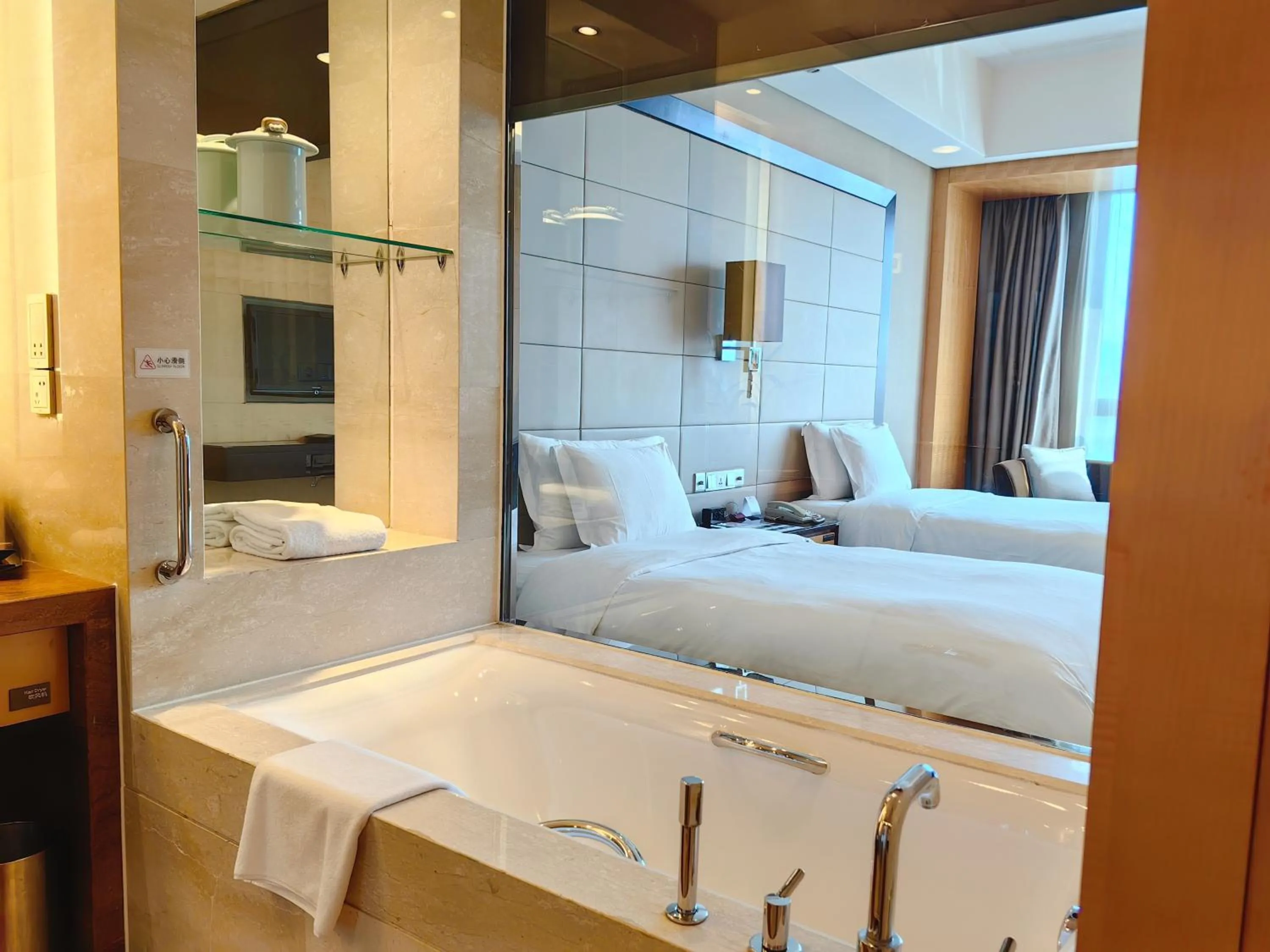 Bathroom, Bed in Crowne Plaza Yichang by IHG