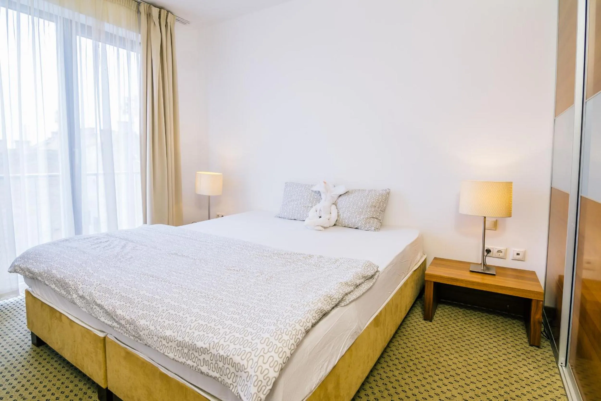 Bedroom in City Gardens Hotel & Wellness