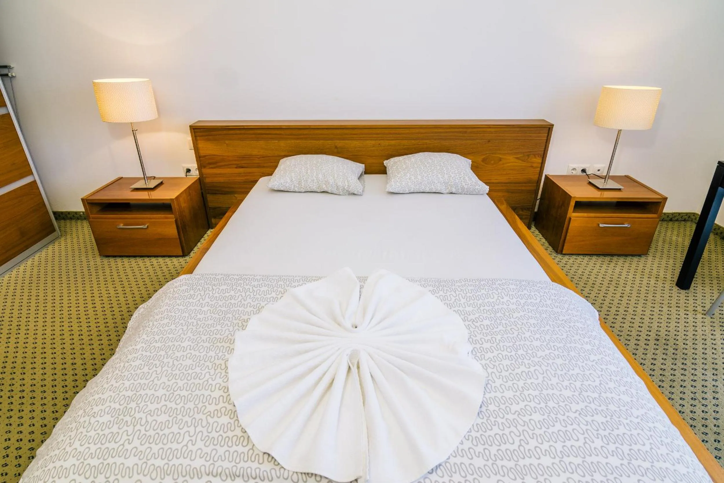 Bedroom in City Gardens Hotel & Wellness