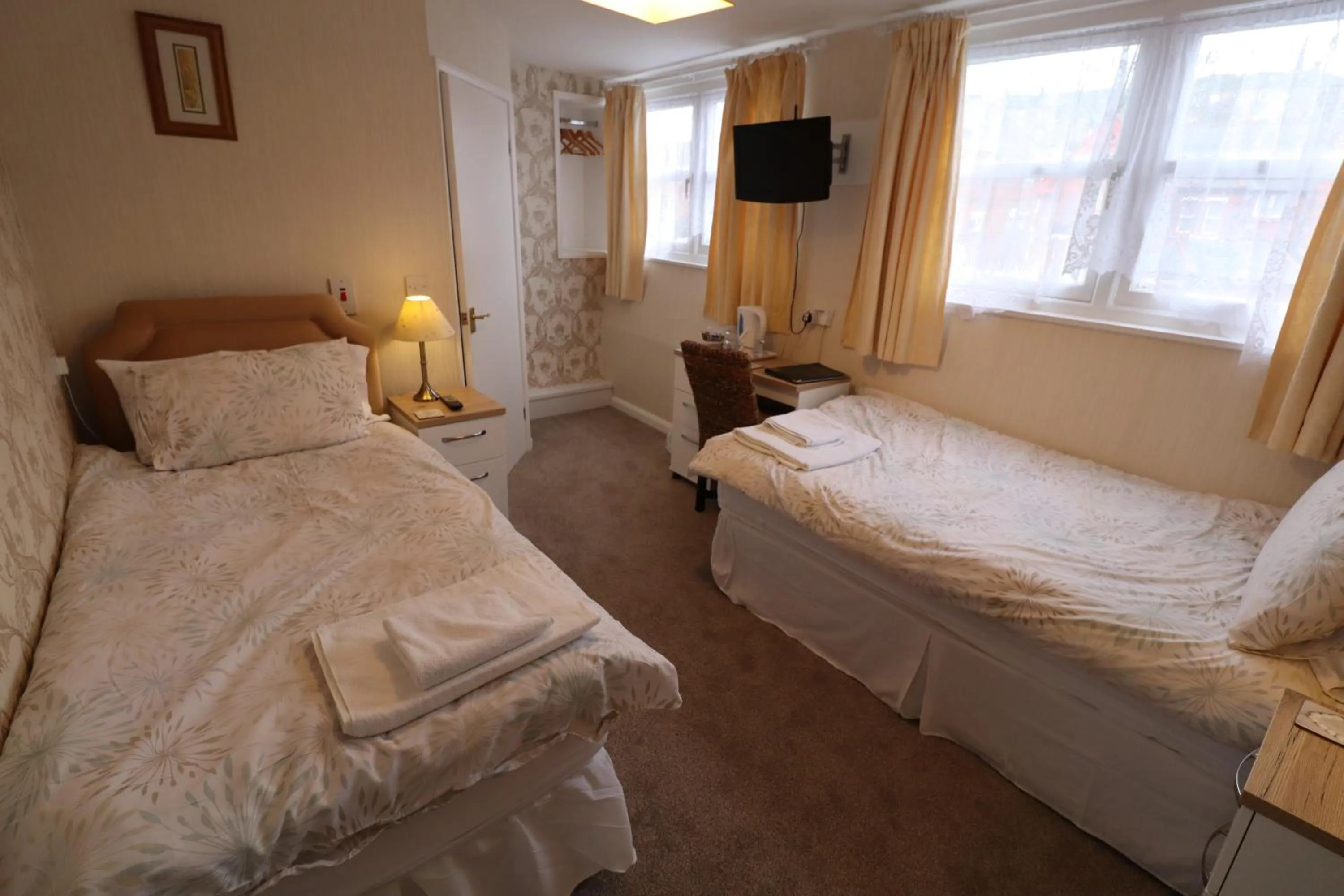 Bed in The Raincliffe Hotel