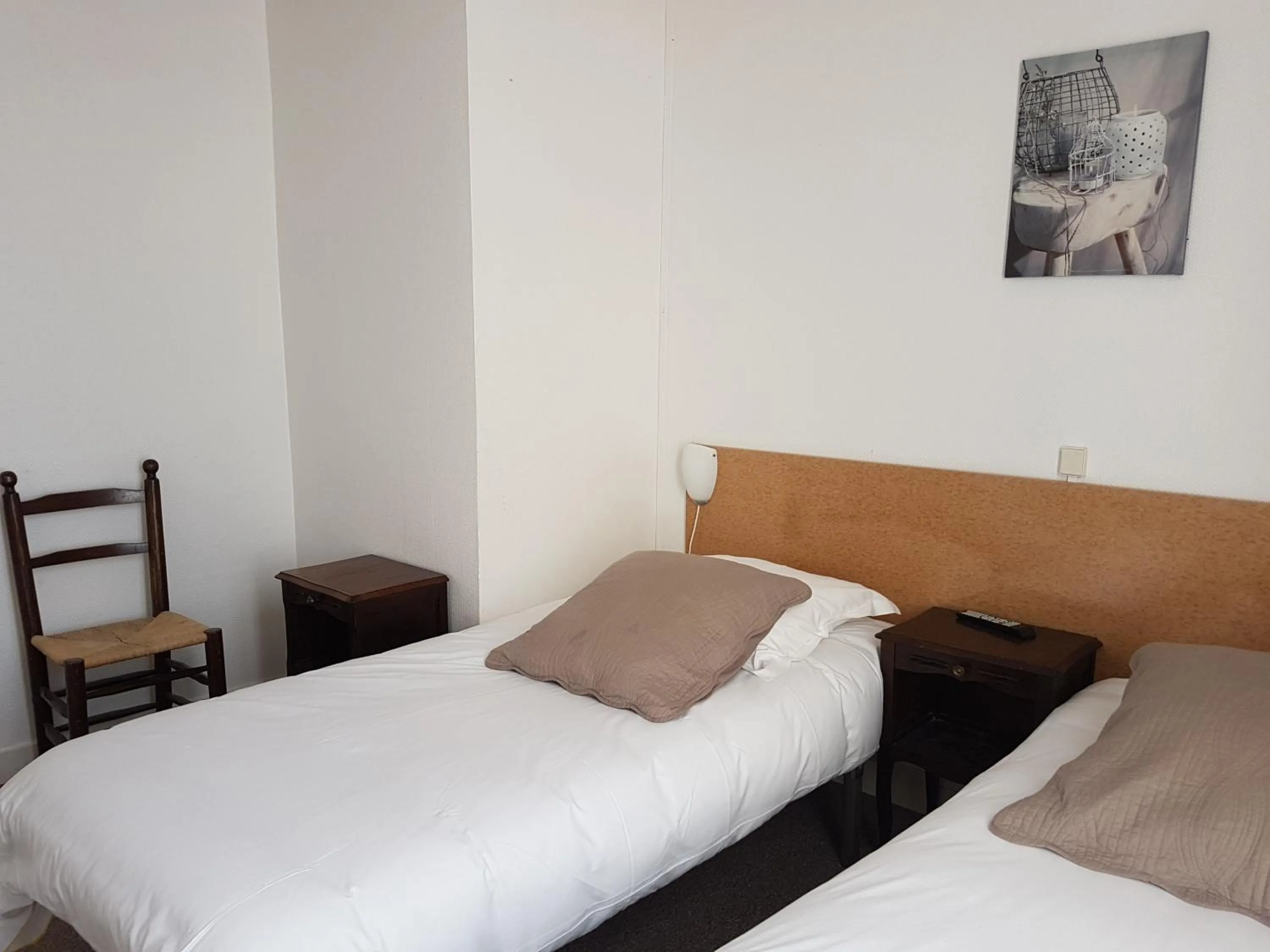 Bed in Hotel de Normandie