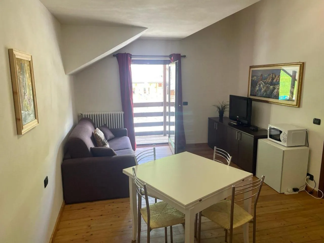 Living room in Residence Le Marmotte