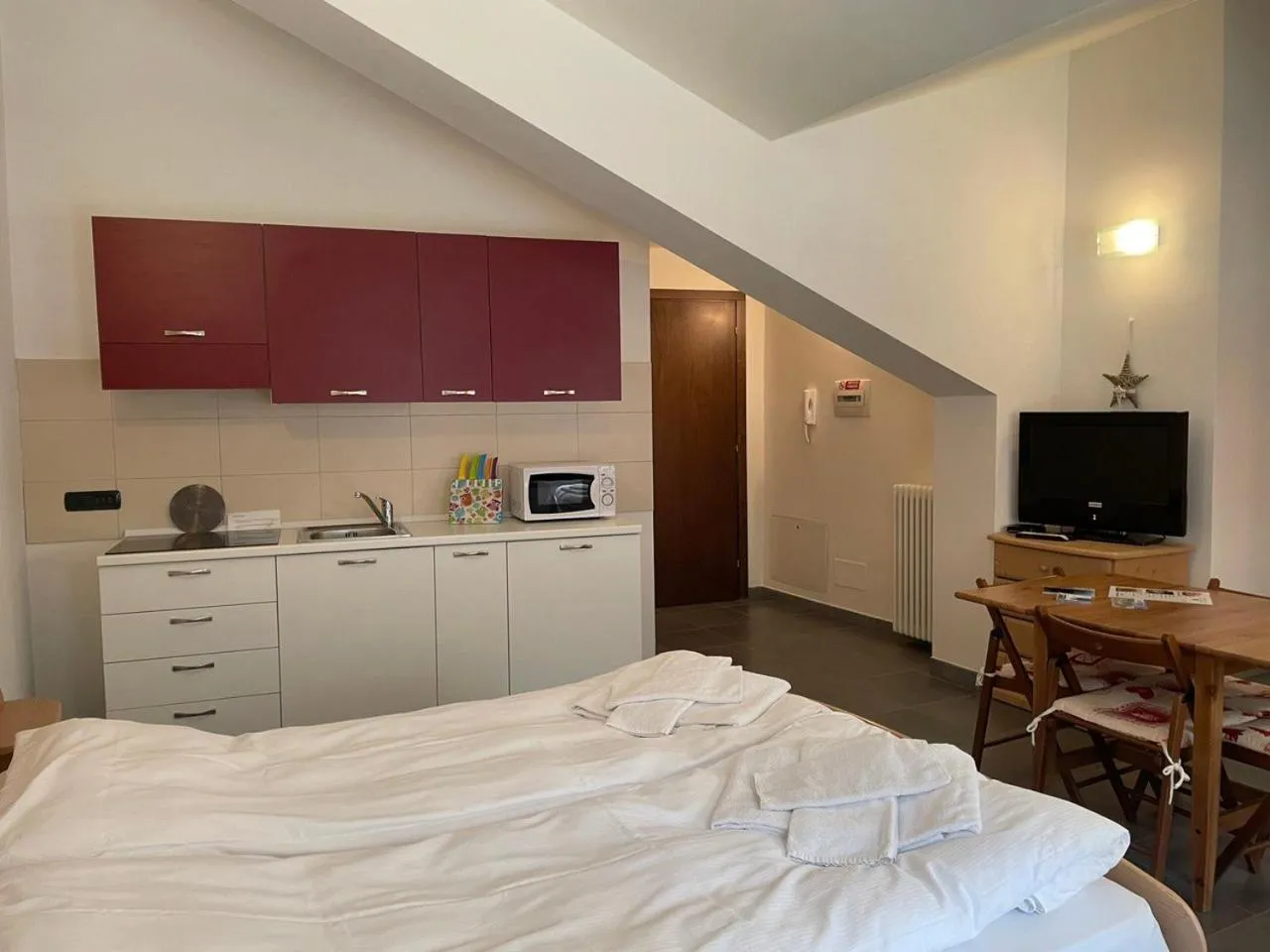 Kitchen or kitchenette, Bed in Residence Le Marmotte