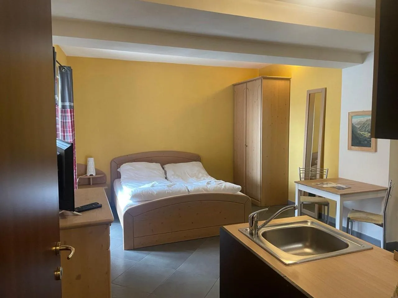 Kitchen or kitchenette, Bed in Residence Le Marmotte