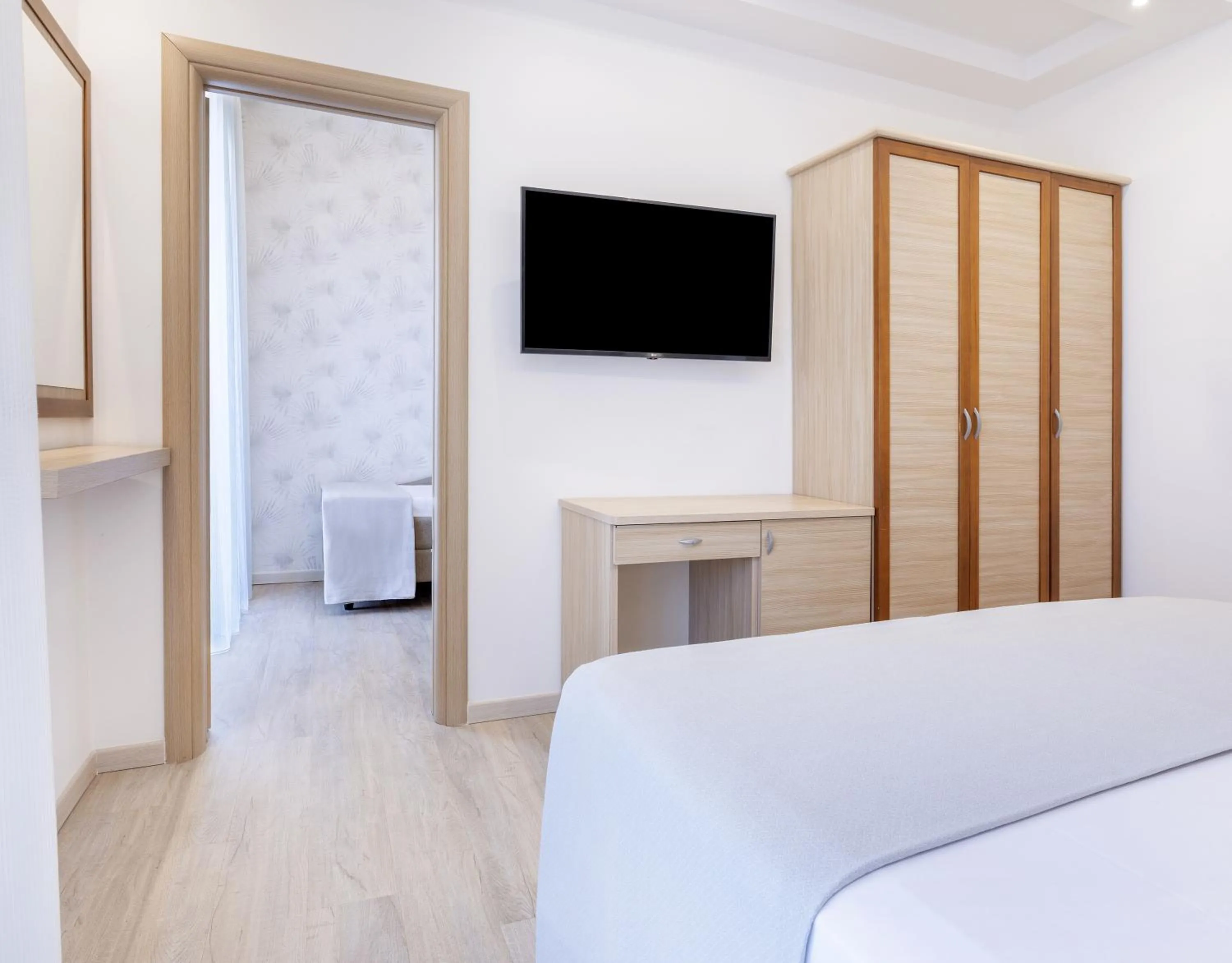 Bed in Hotel Riviera