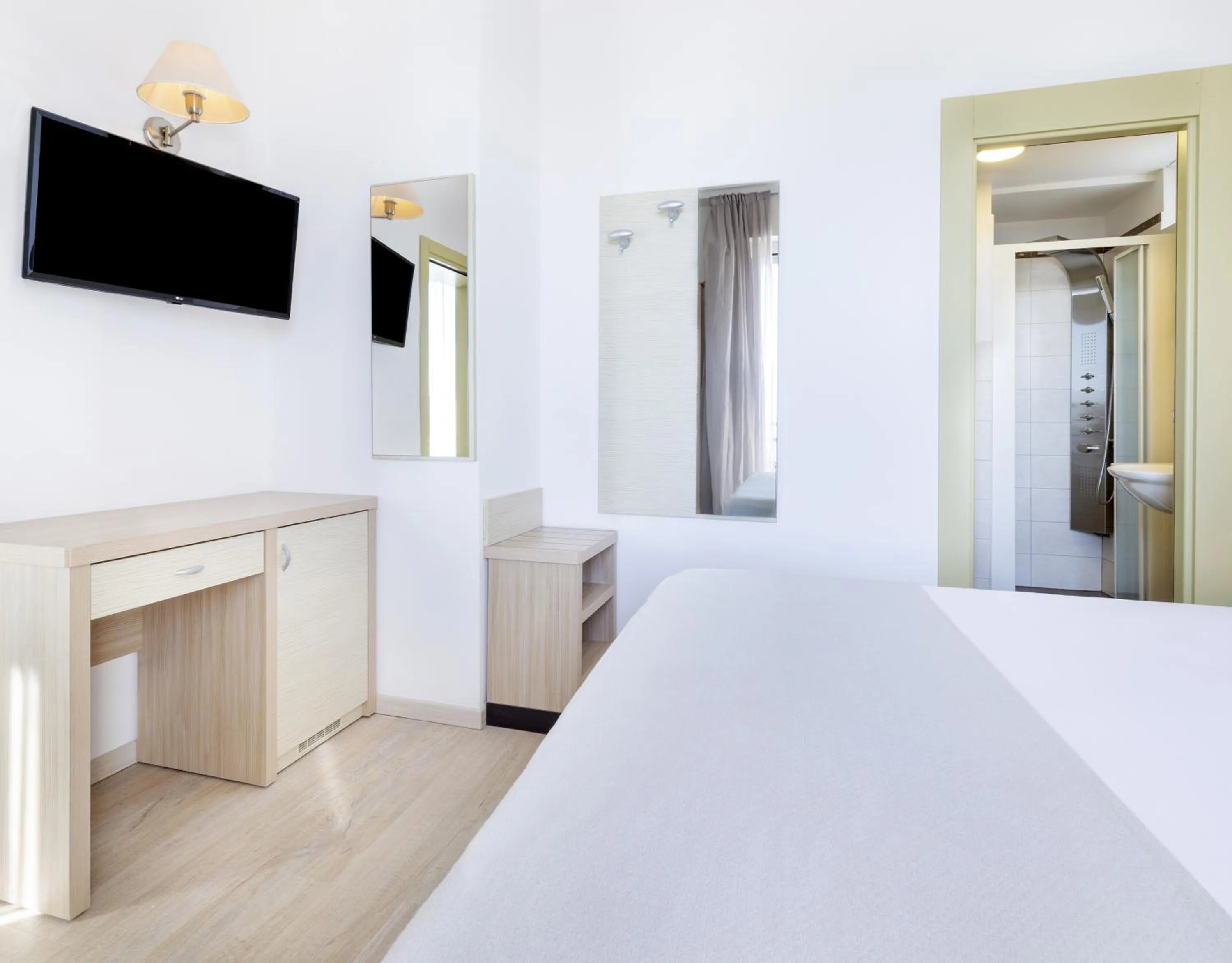 Bed in Hotel Riviera