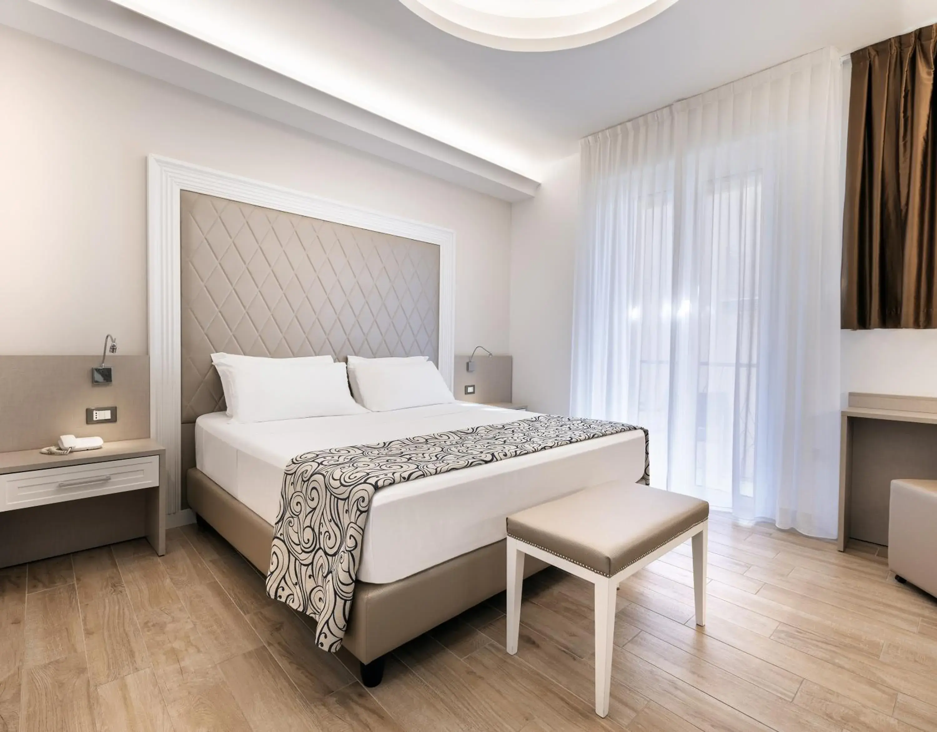 Bed in Hotel Riviera