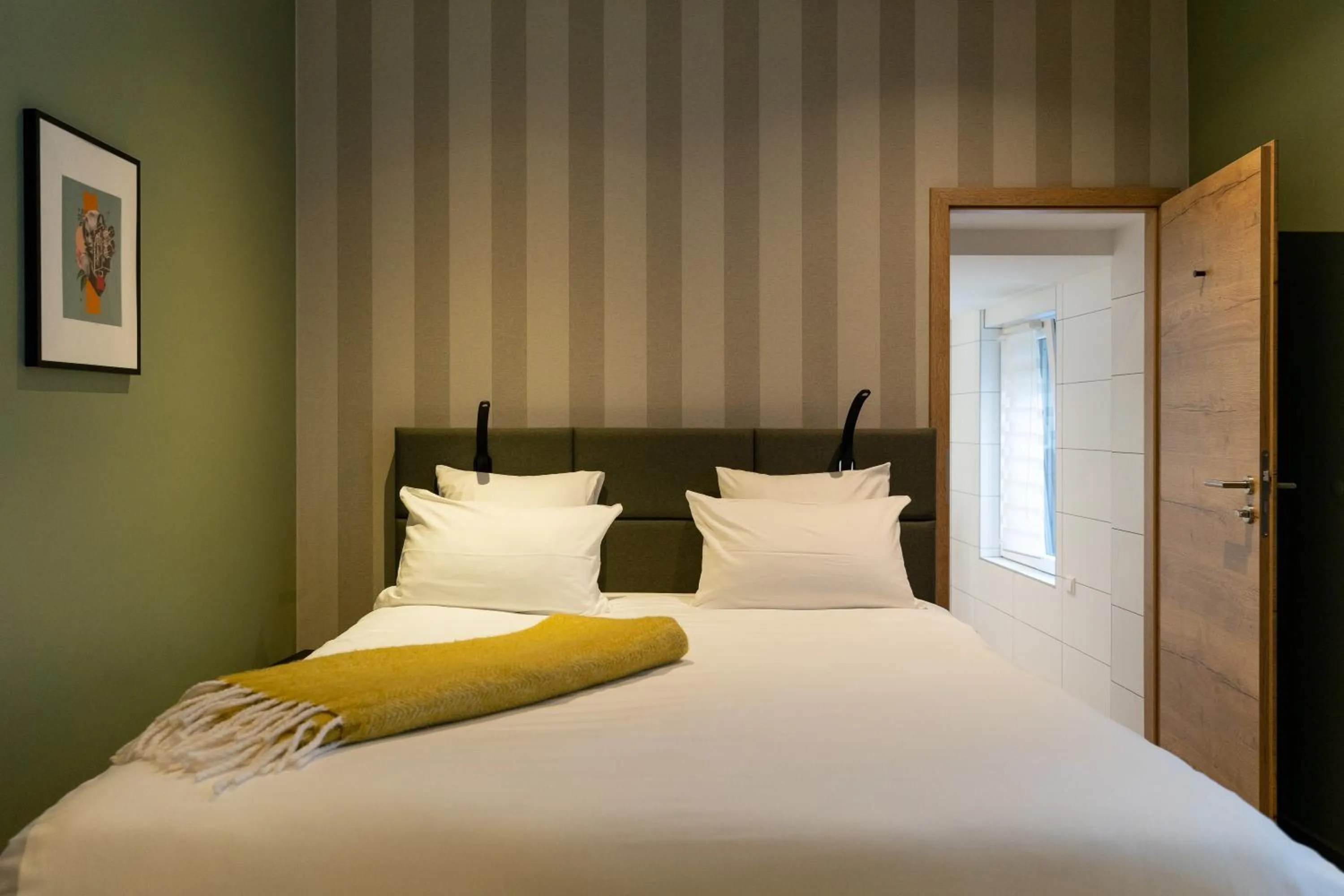 Bed in Hostellerie du Grünewald