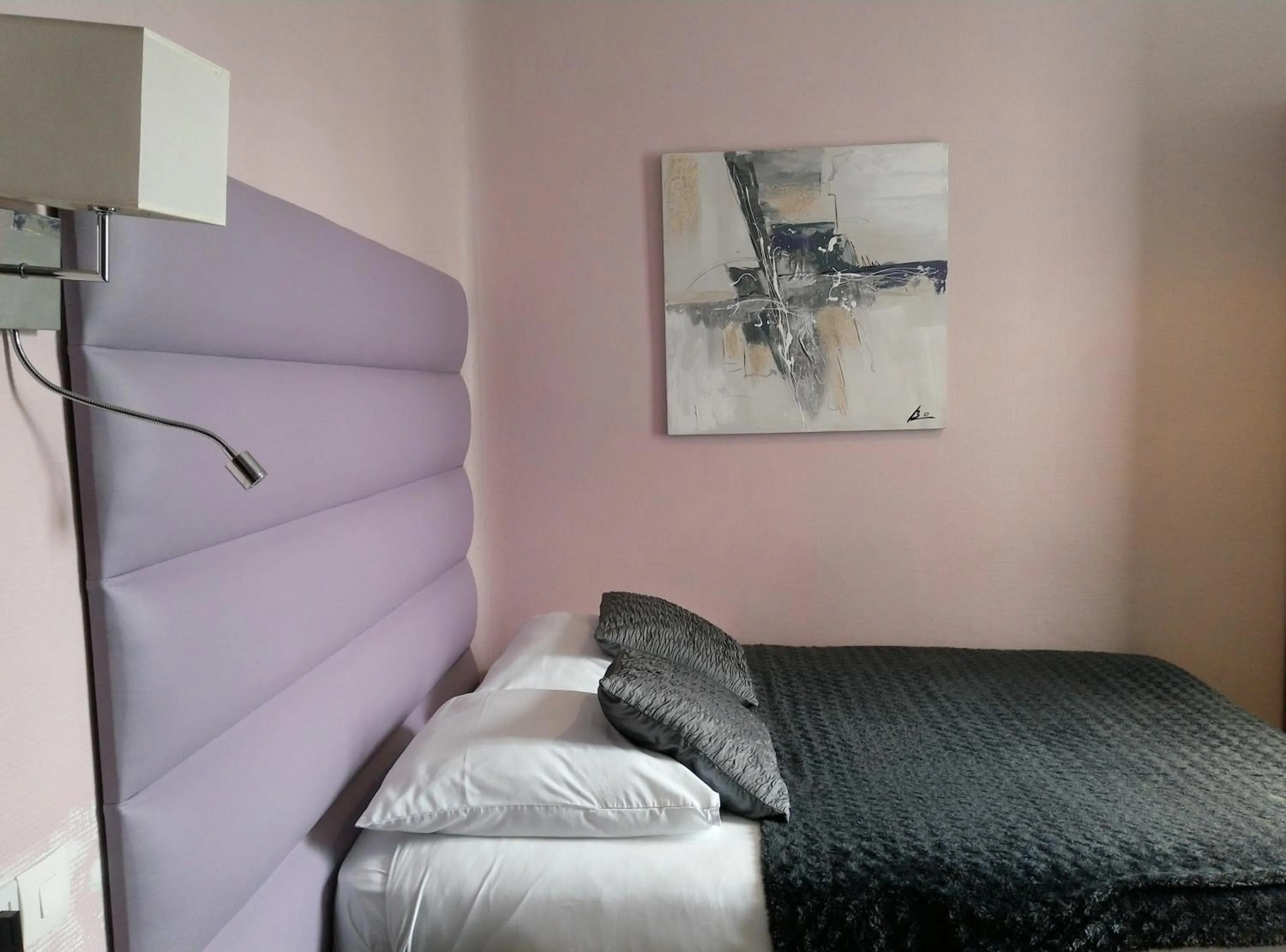 Bed in Hotel Napoléon