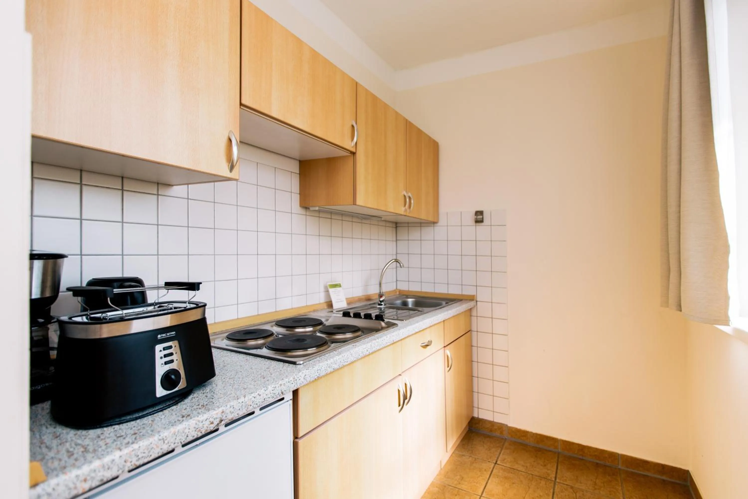Kitchen or kitchenette in FerienResidenz MüritzPark
