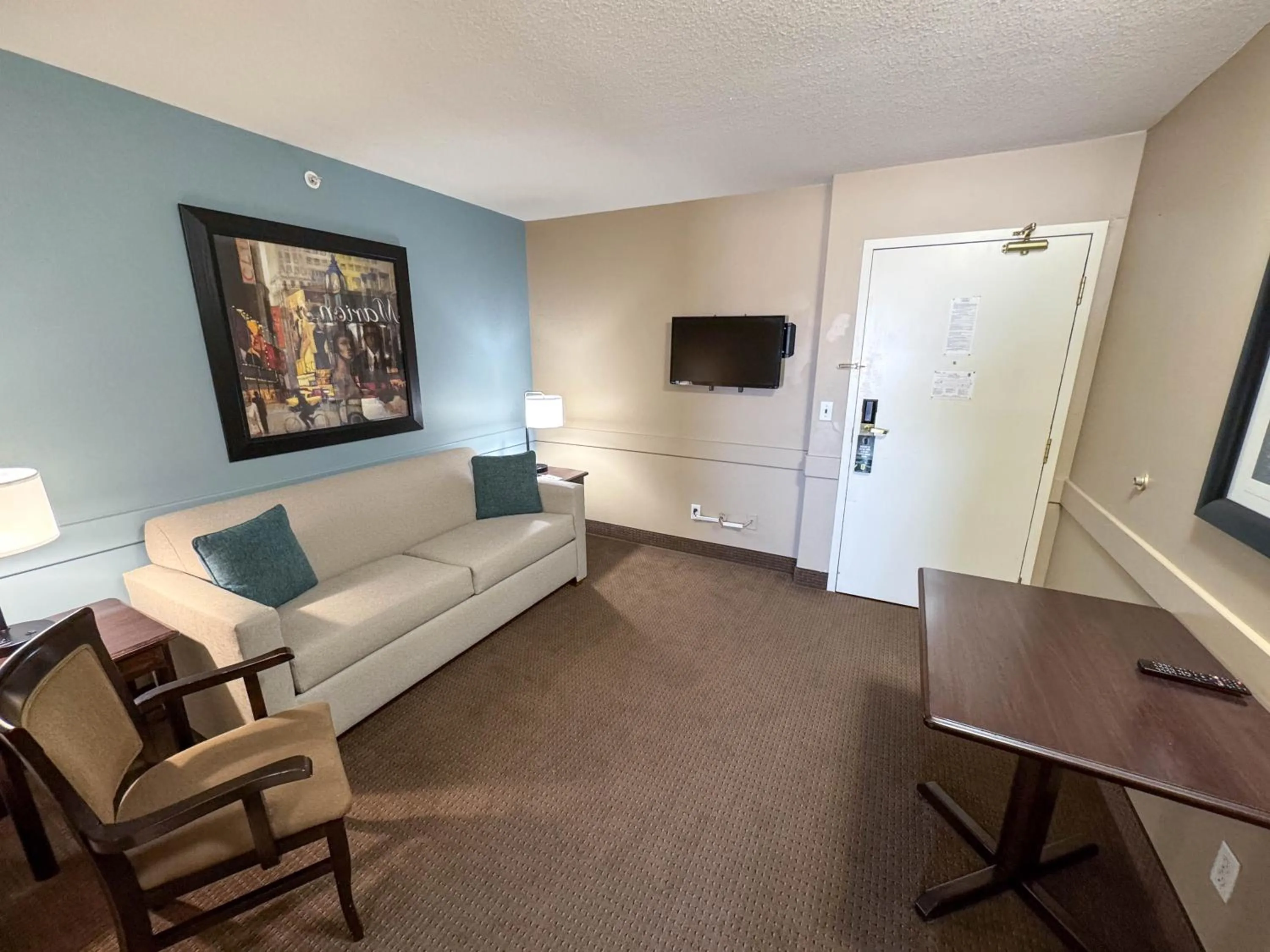 Living room in Super 8 by Wyndham Edmonton South