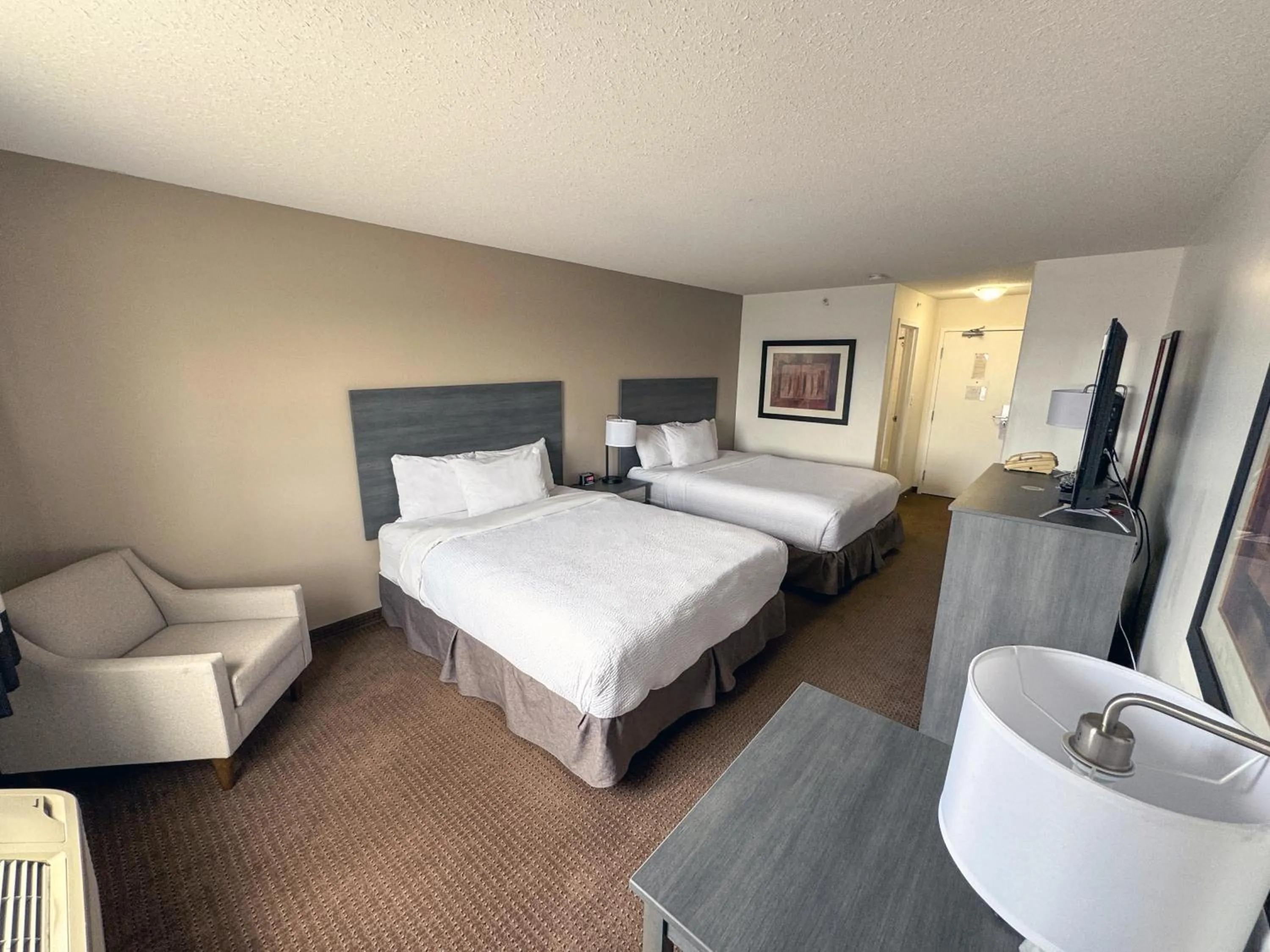 Bed in Ramada by Wyndham Sherwood Park