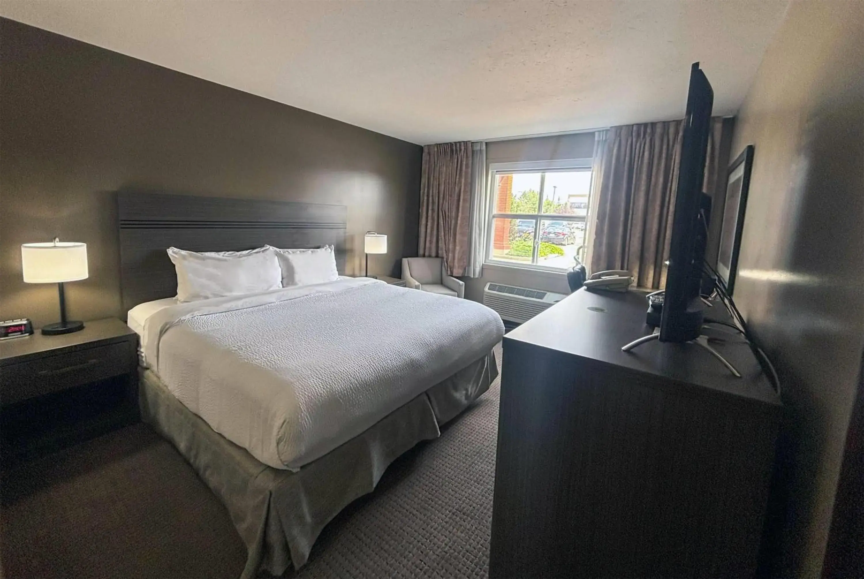 Photo of the whole room, Bed in Ramada by Wyndham Sherwood Park Photo of the whole room, Bed in Ramada by Wyndham Sherwood Park