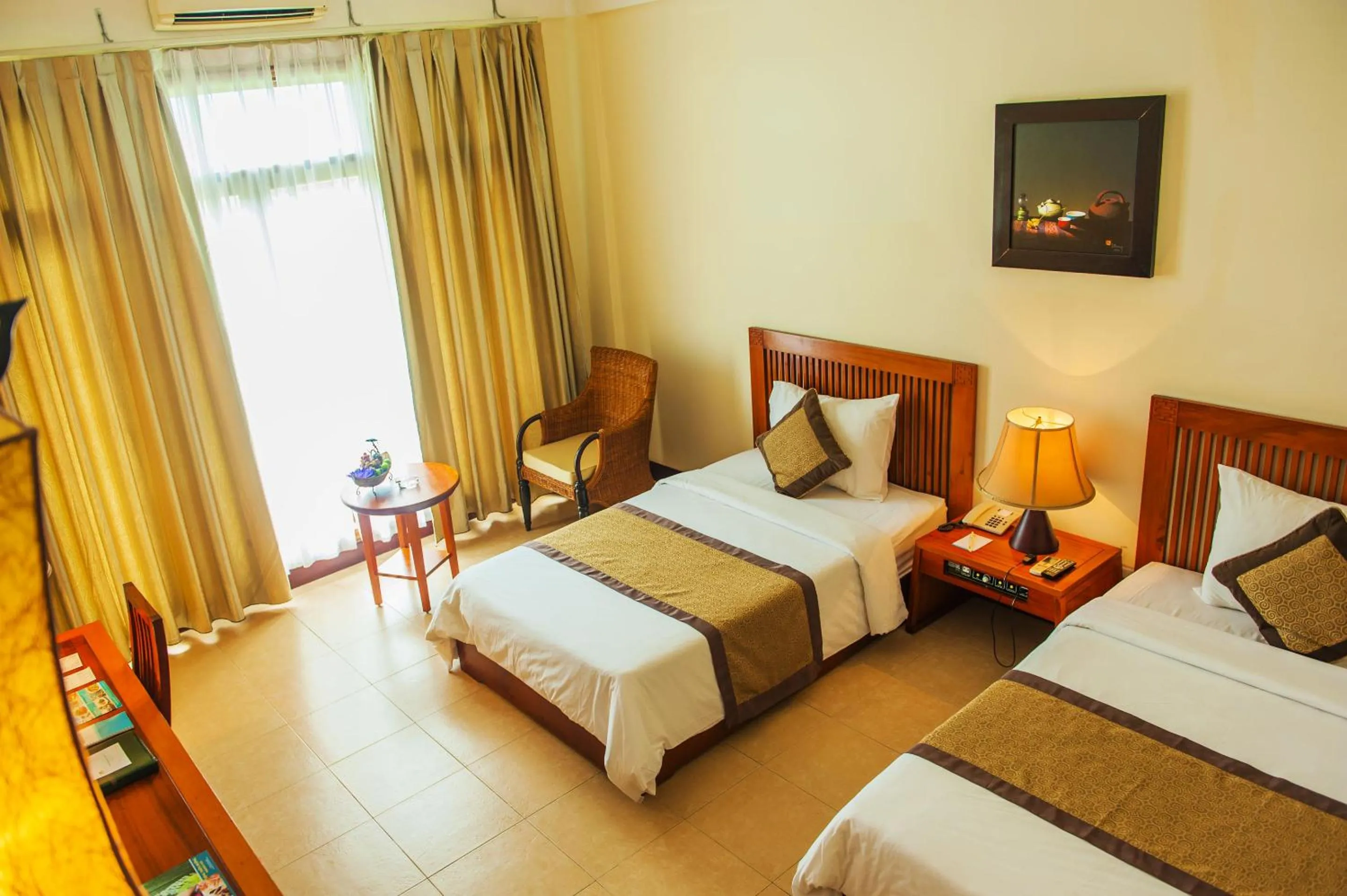 Bed in Sun Spa Resort & Villa