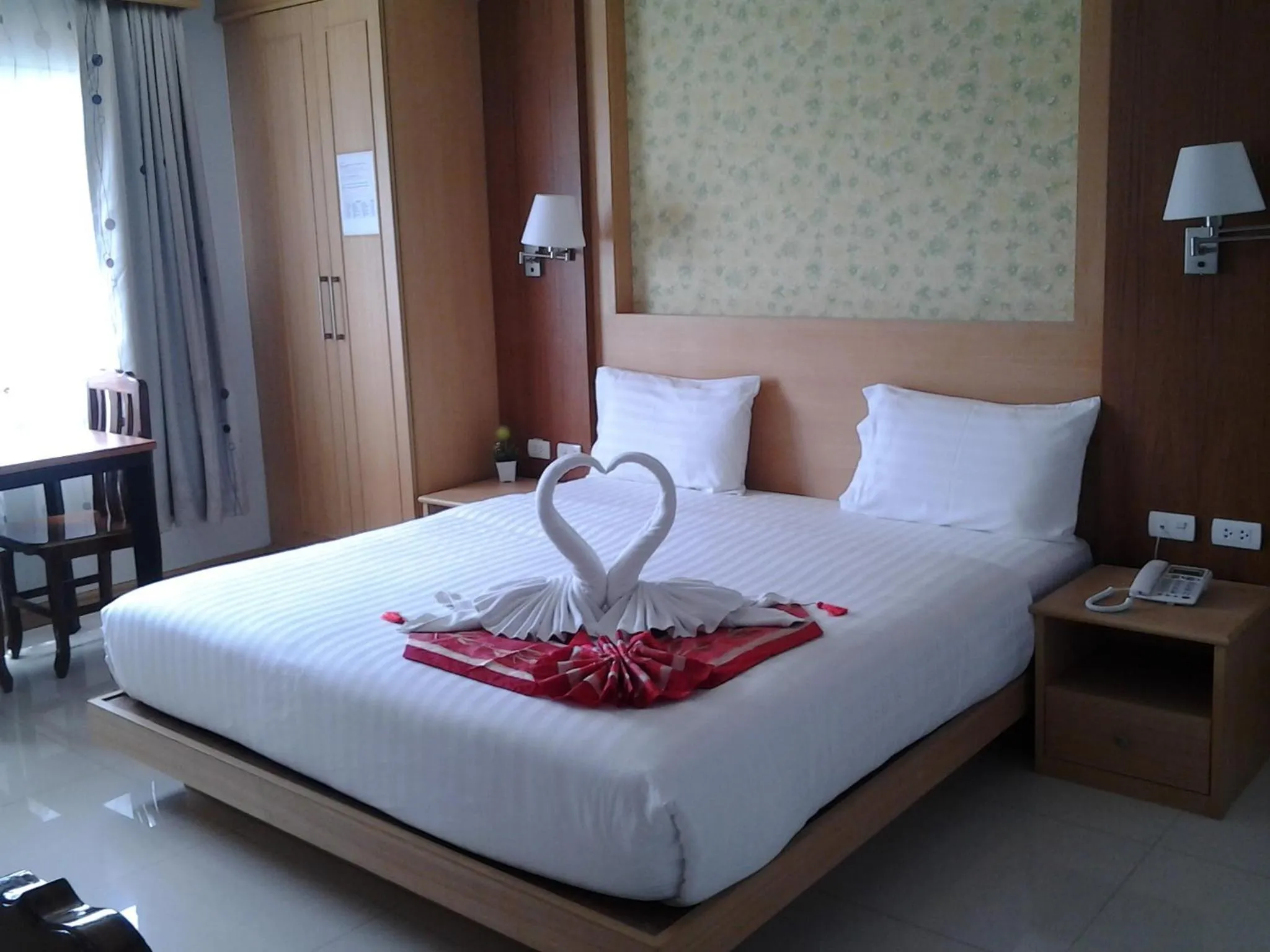 Bedroom, Bed in Green Harbor Hotel & Service Apartment