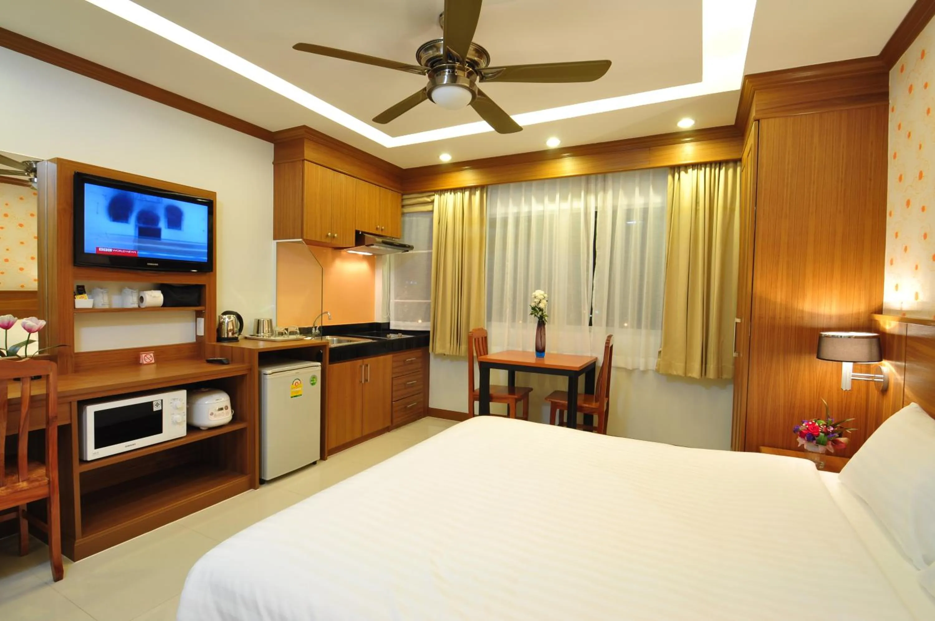 Bedroom, Bed in Green Harbor Hotel & Service Apartment