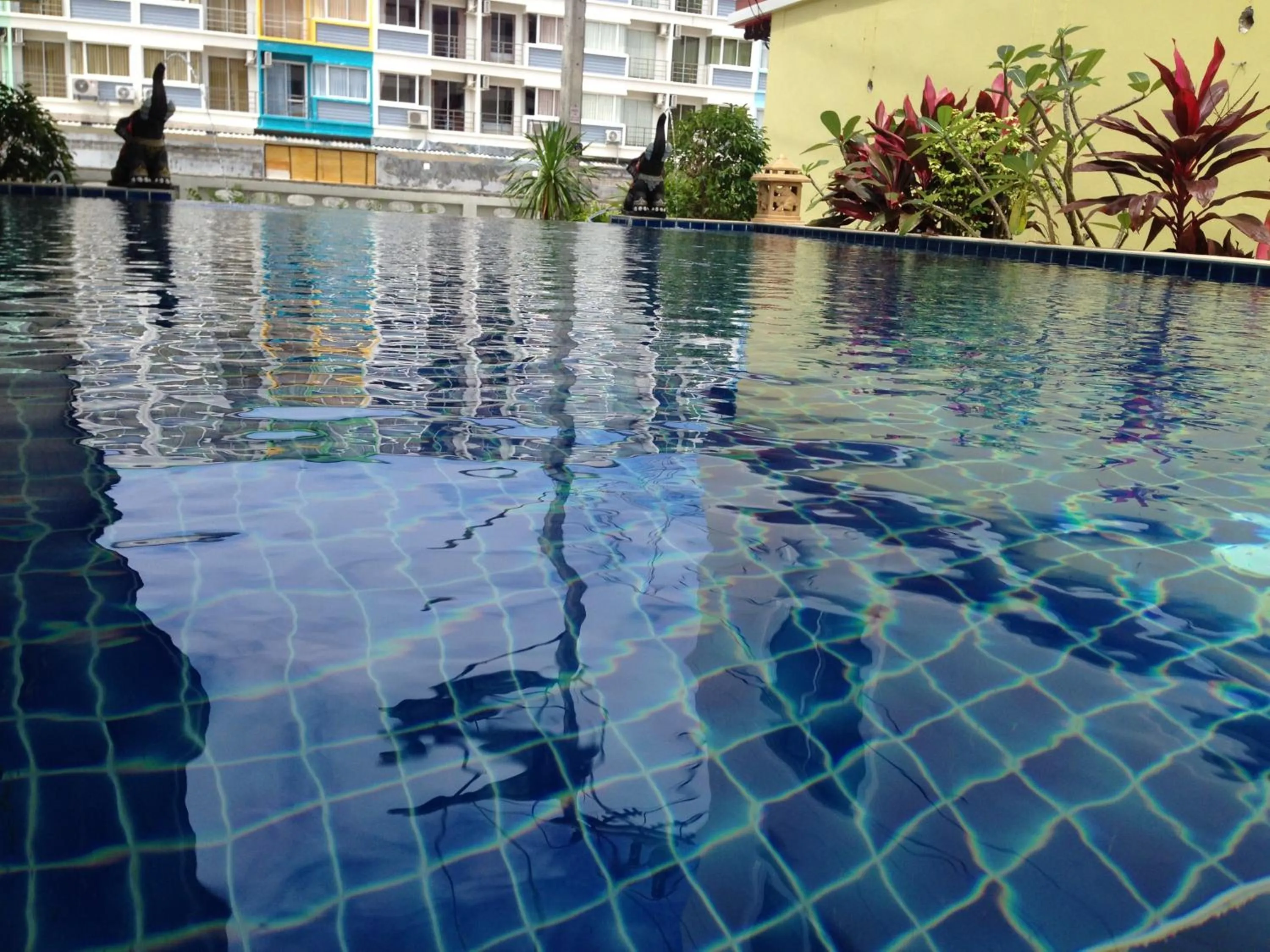 Swimming pool in Green Harbor Hotel & Service Apartment