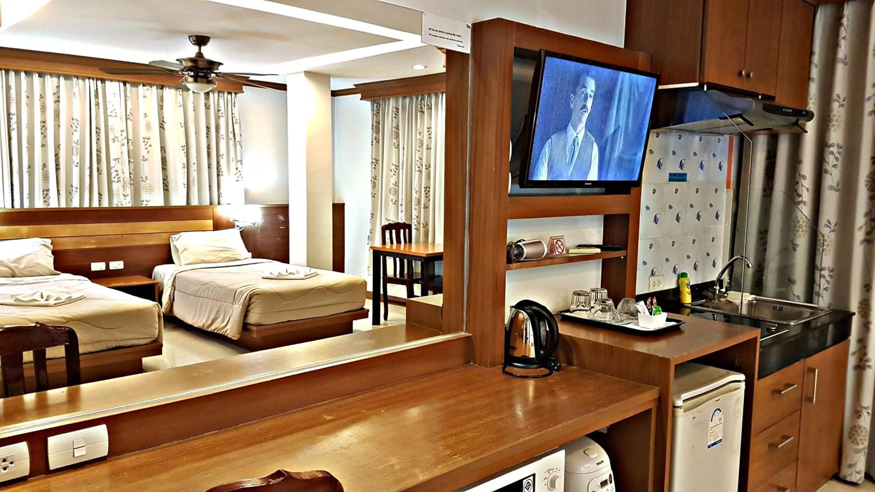 Bed in Green Harbor Hotel & Service Apartment