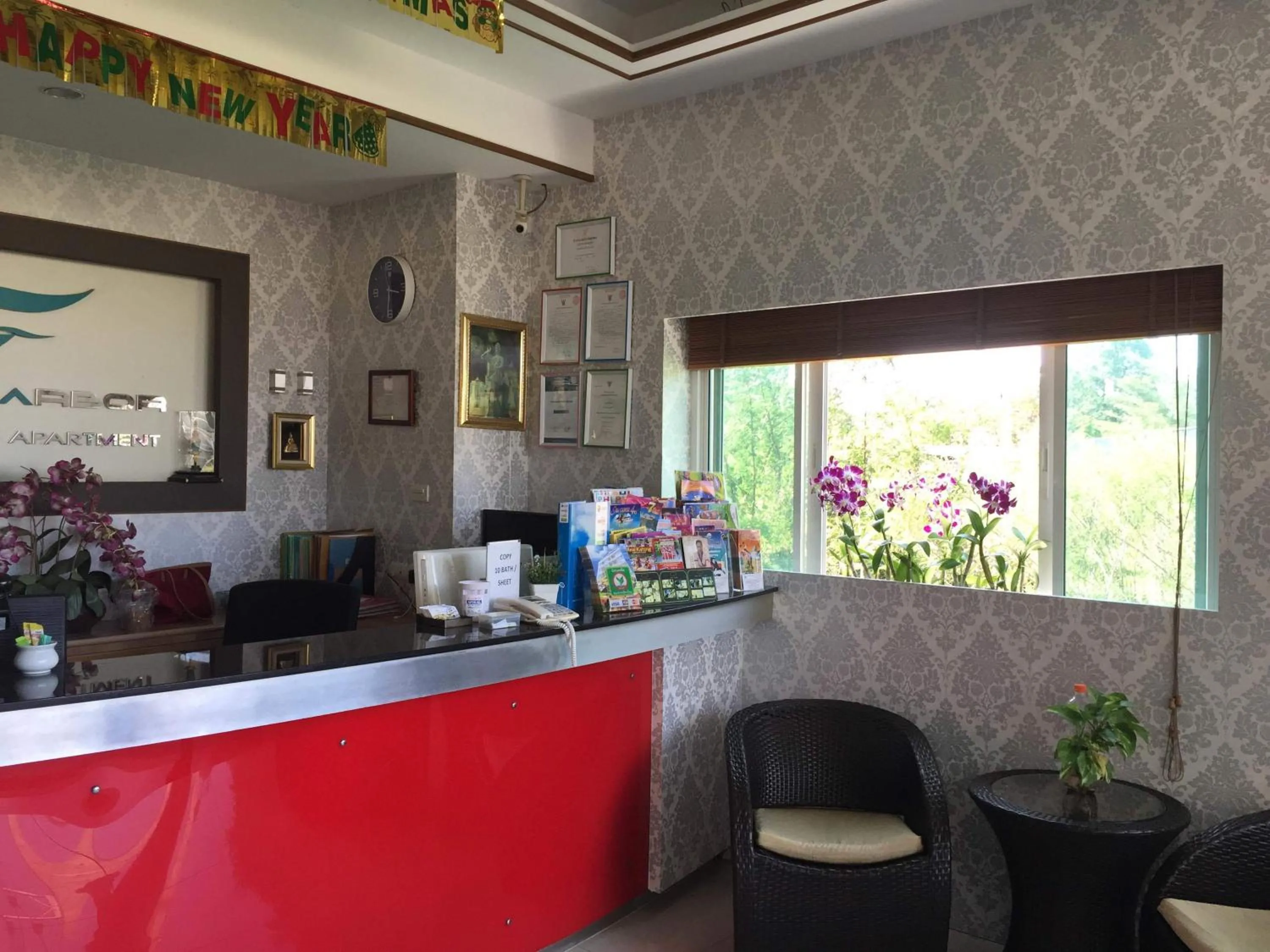 Lobby or reception in Green Harbor Hotel & Service Apartment