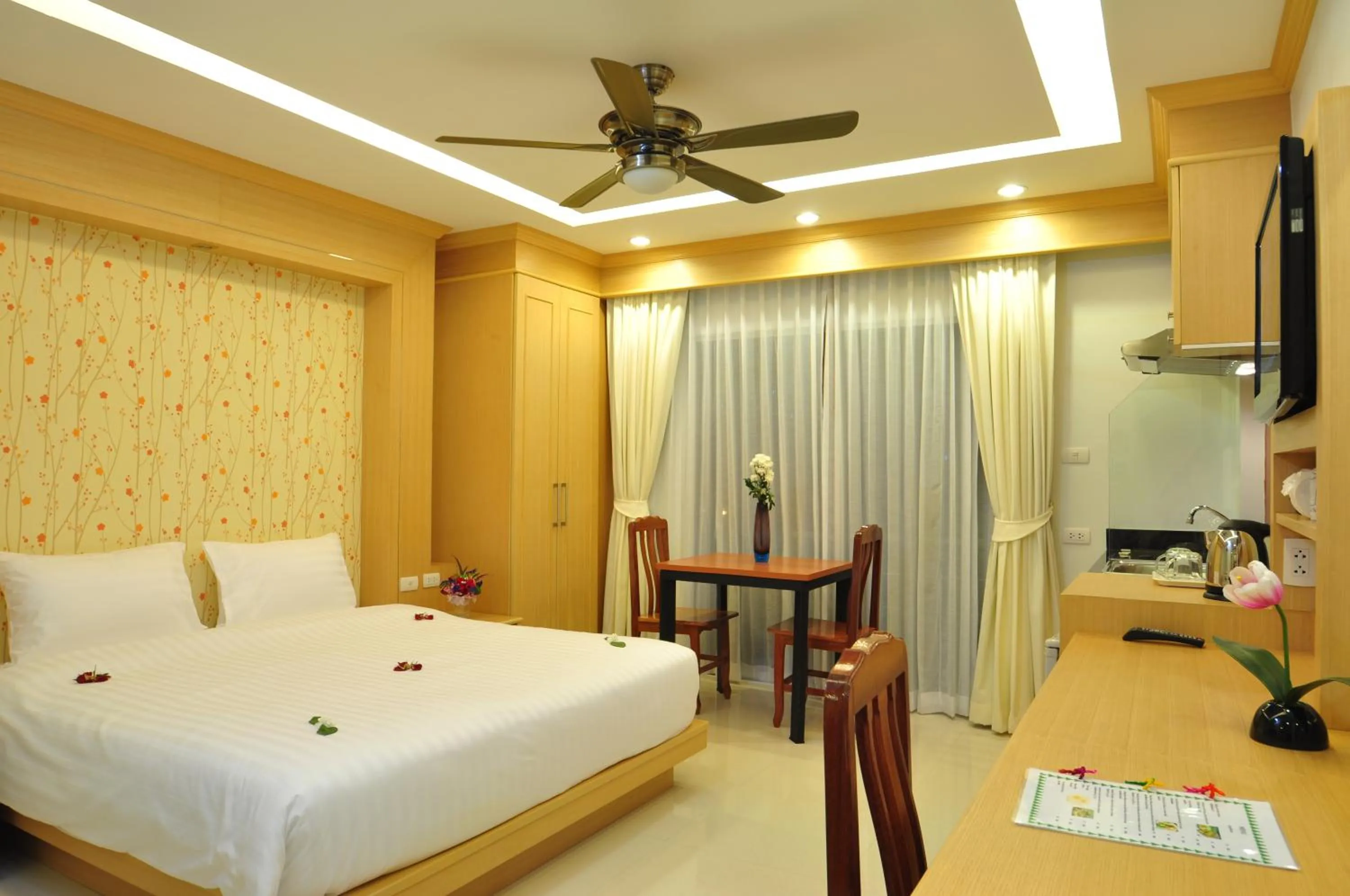 Bedroom, Bed in Green Harbor Hotel & Service Apartment