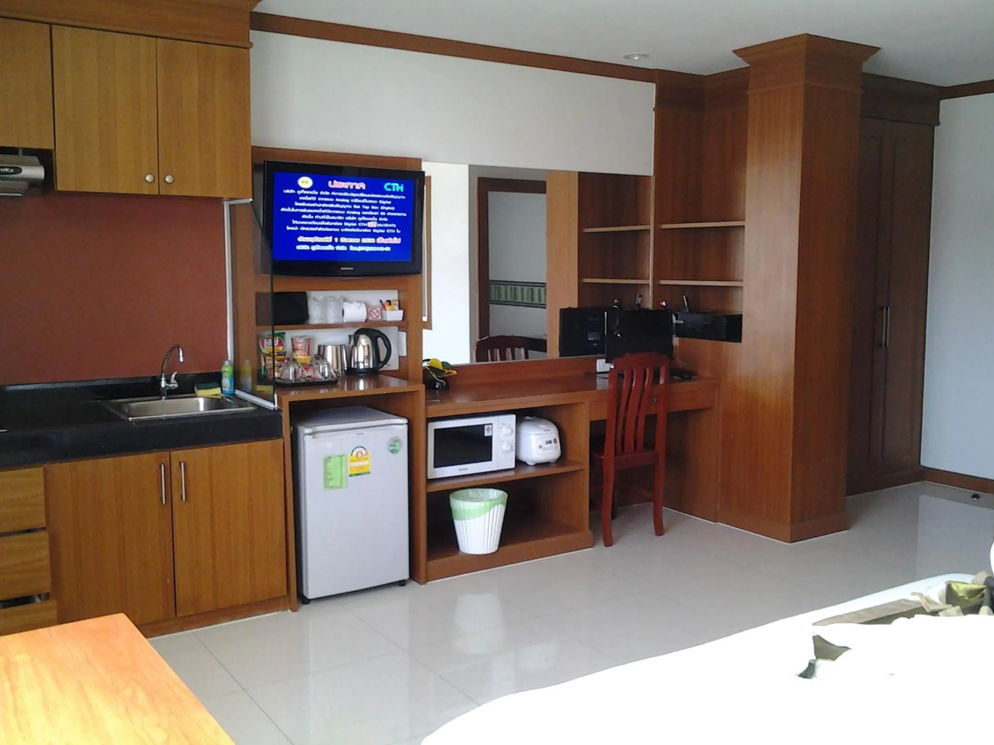 Kitchen or kitchenette in Green Harbor Hotel & Service Apartment