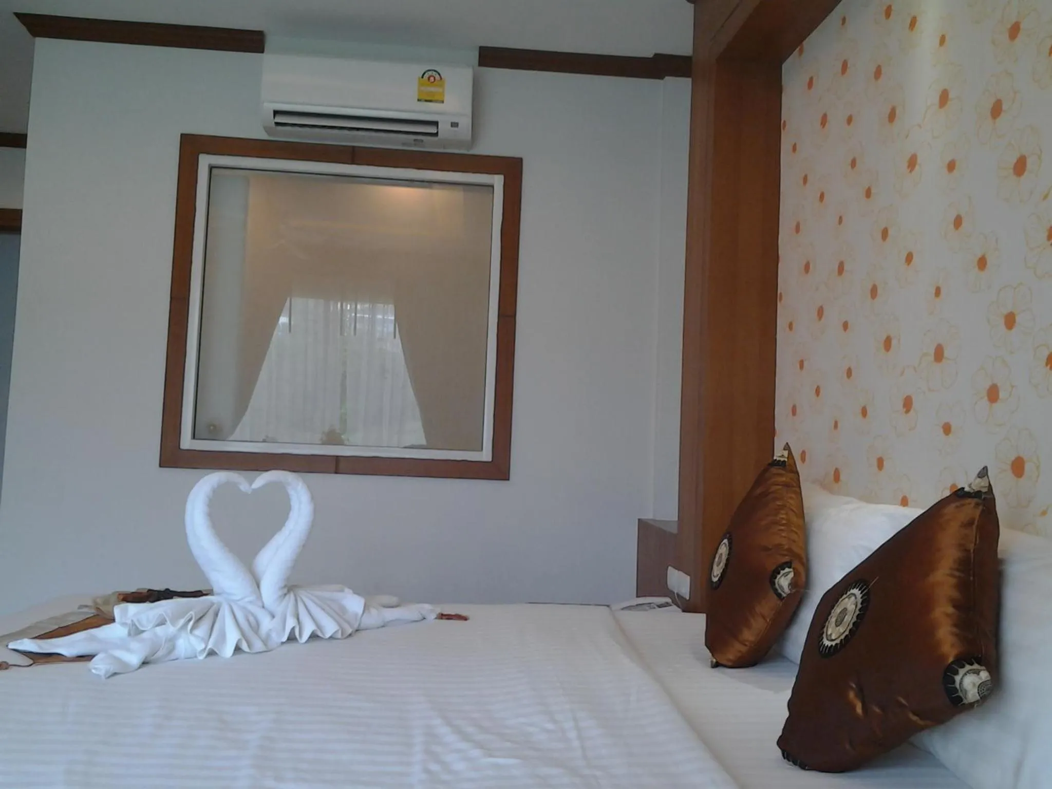 Bedroom, Bed in Green Harbor Hotel & Service Apartment