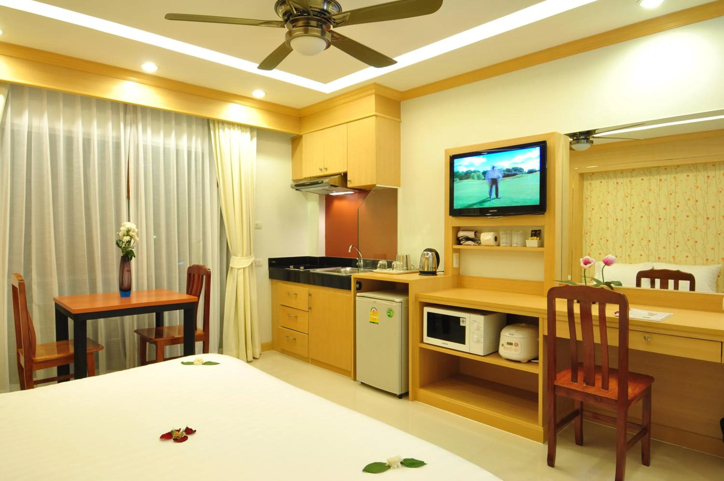 Kitchen or kitchenette in Green Harbor Hotel & Service Apartment
