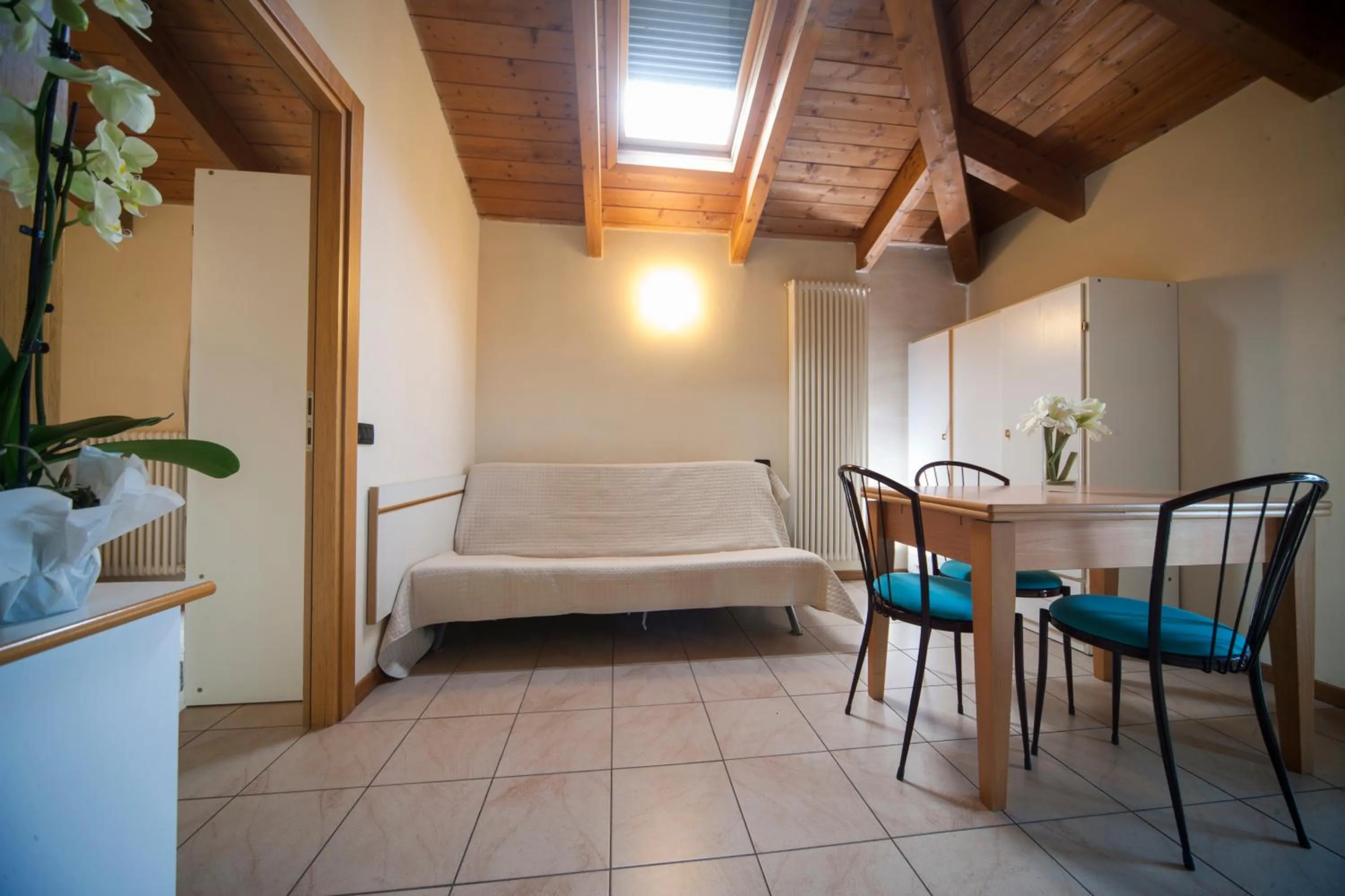 Living room, Bed in Residence il Capodoglio