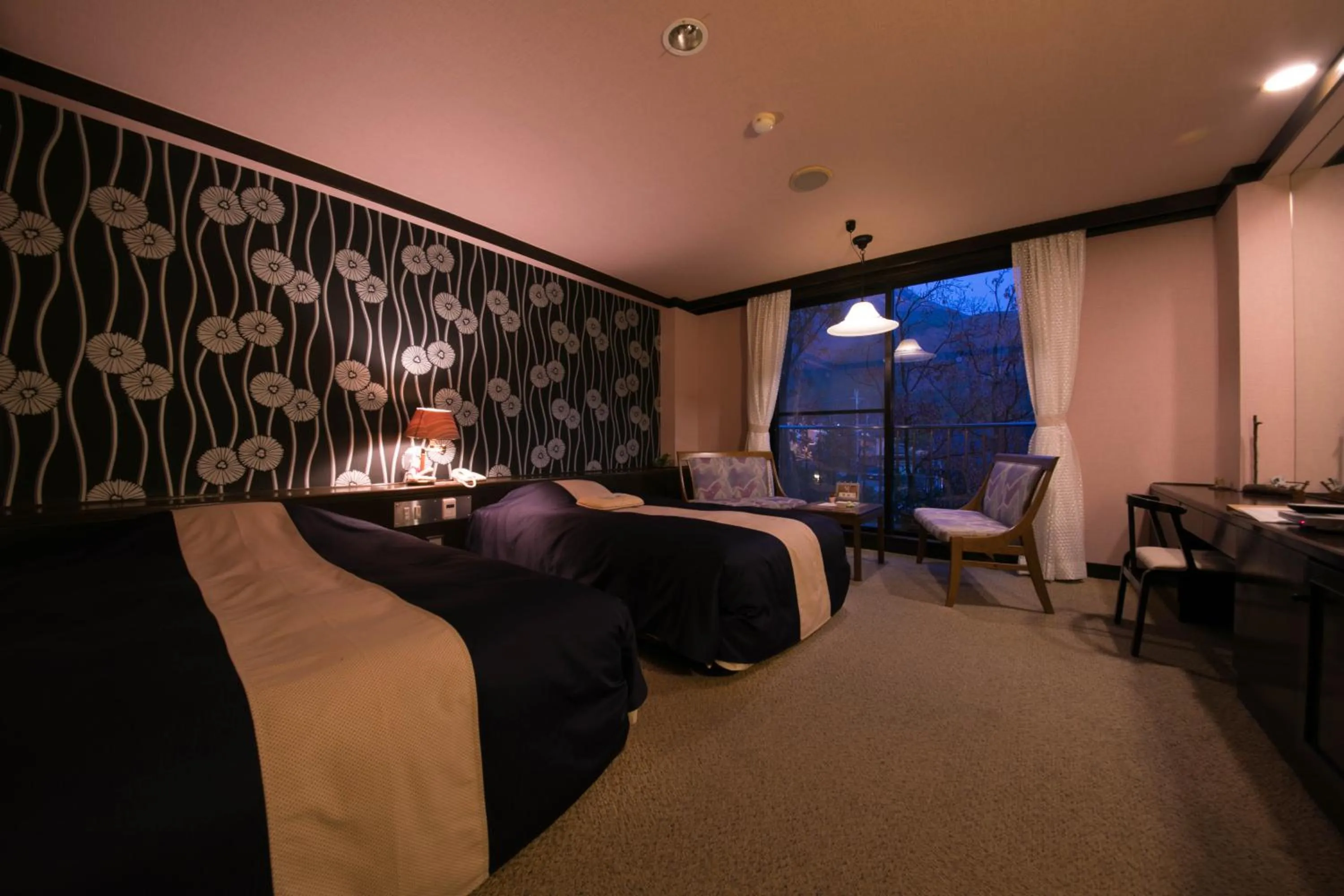 Bed in Yufuin Kaorinosato Hanamura