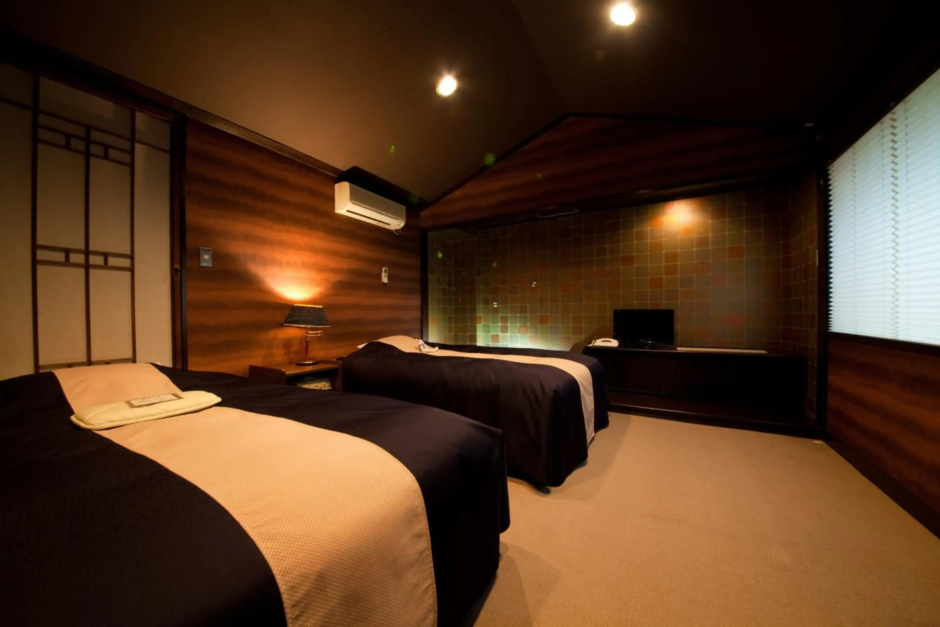 Bed in Yufuin Kaorinosato Hanamura Bed in Yufuin Kaorinosato Hanamura