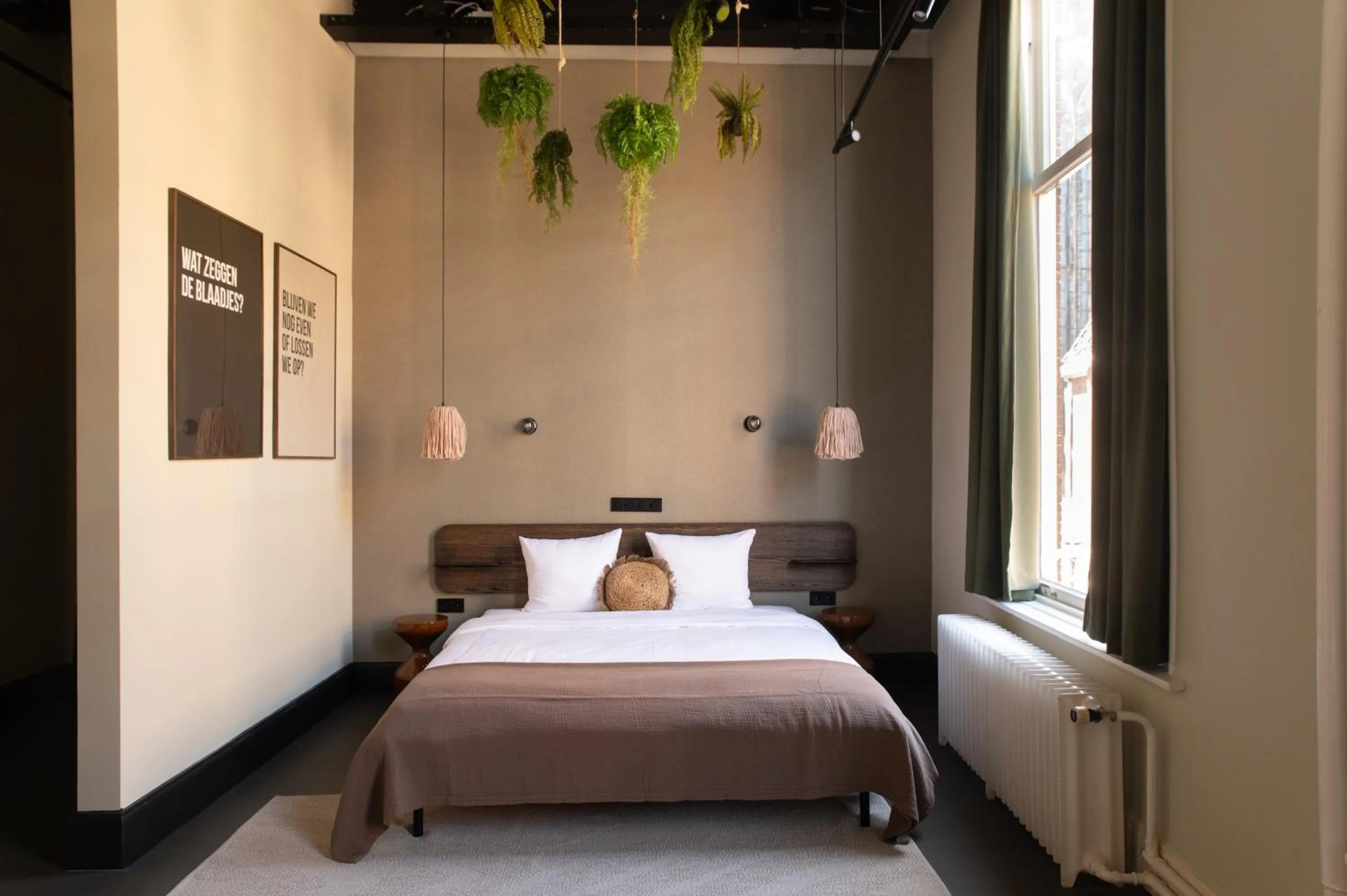 Bed in Anne&Max Boutique Hotel