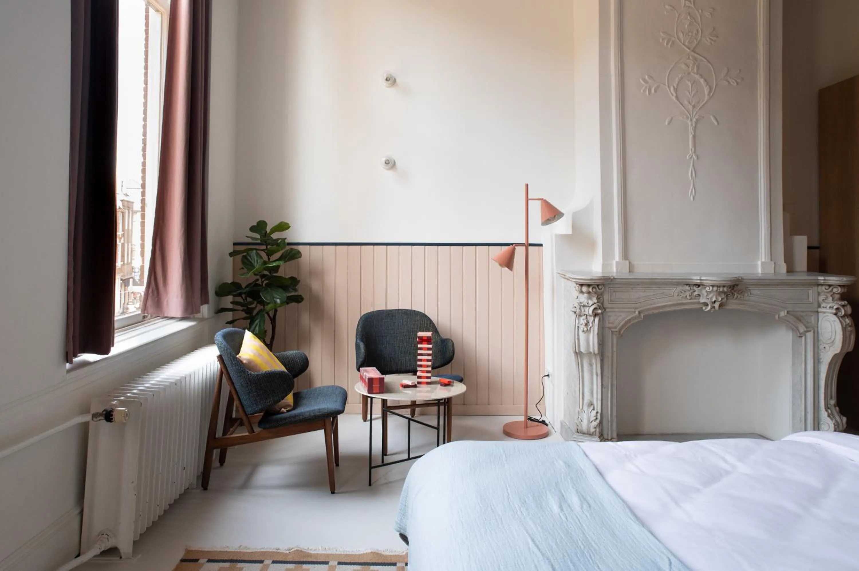 Bed in Anne&Max Boutique Hotel